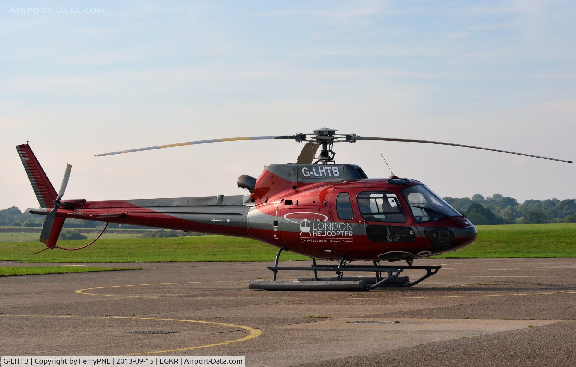 G-LHTB, 2009 Eurocopter AS-350B-2 Ecureuil Ecureuil C/N 4712, London Helicopters AS350 parked in front of hangar at Redhill.