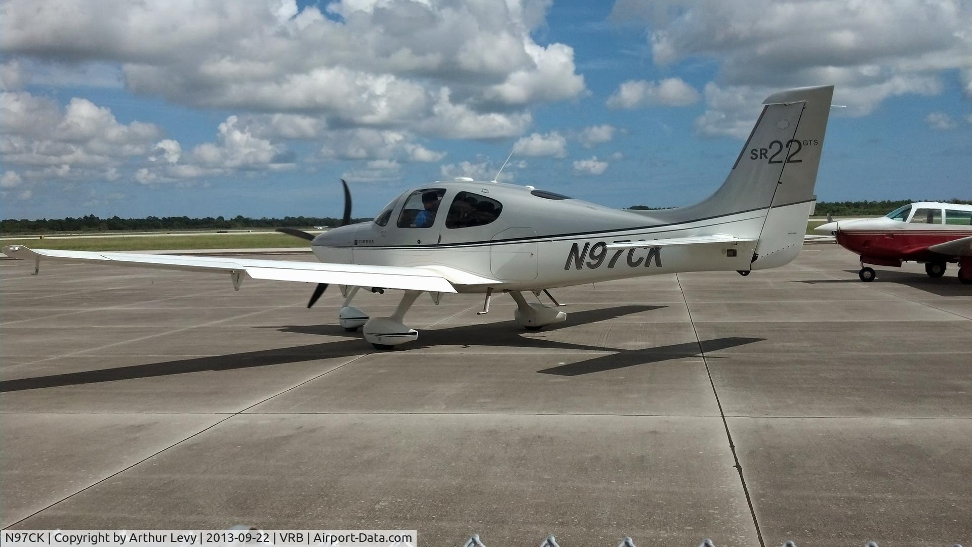 N97CK, 2009 Cirrus SR22 GTS C/N 3419, motor purred like a kitten, very quiet and smooth, gorgeous silver looks like a big plane