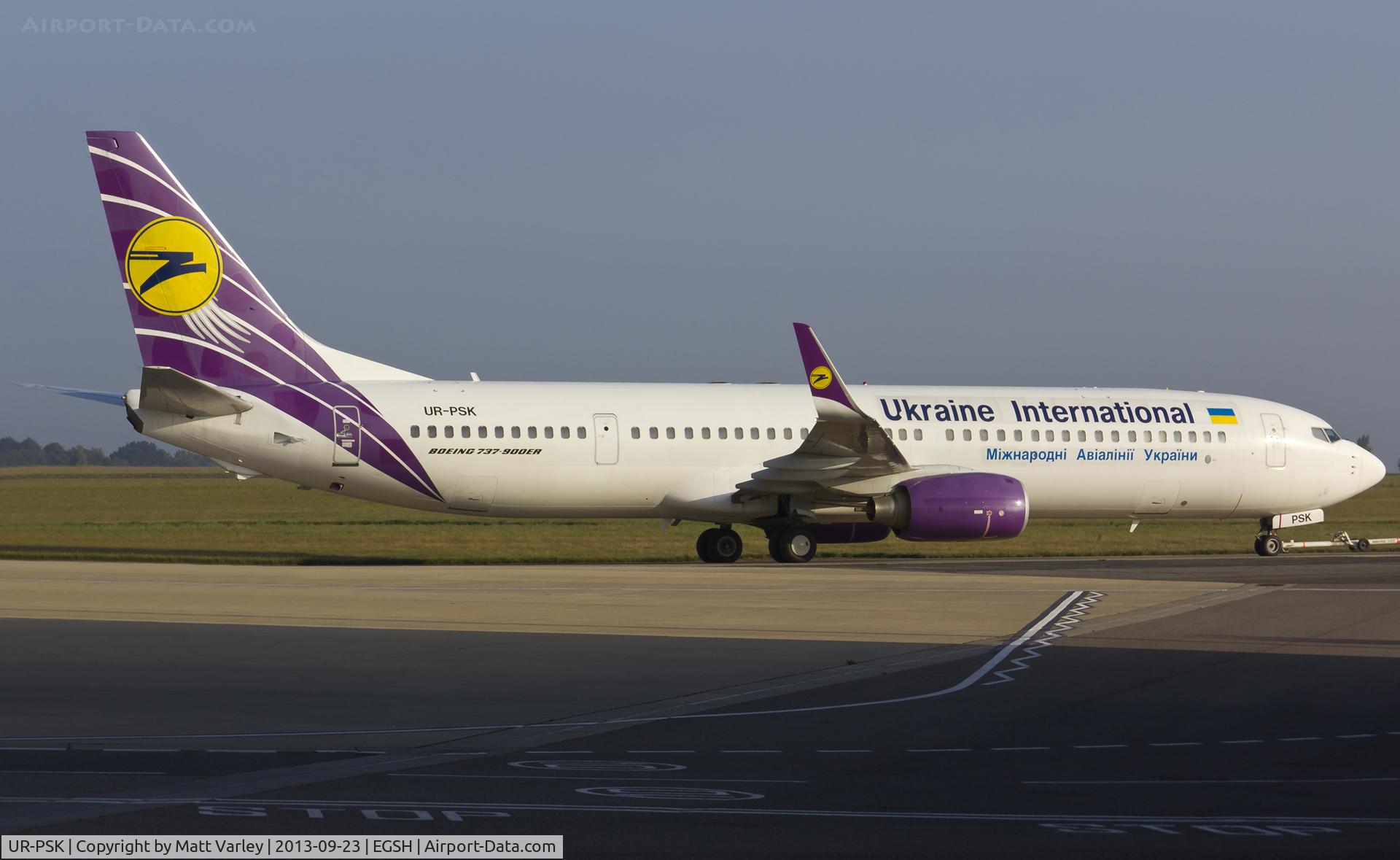 UR-PSK, 2009 Boeing 737-94X/ER C/N 36086, Being towed from stand 6...