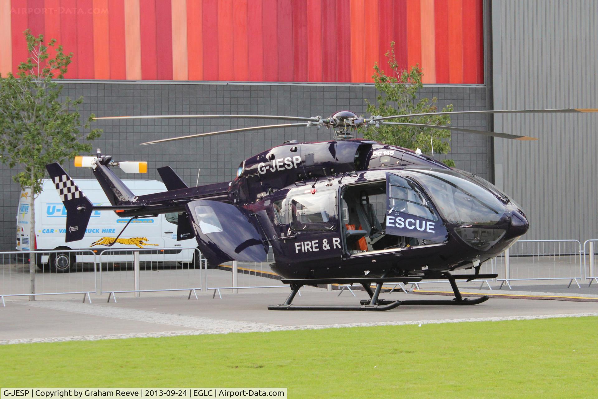 G-JESP, 2013 Eurocopter EC-145 (BK-117C-2) C/N 9570, Parked at Helitech 2013 at the ExCel centre next to London City Airport.