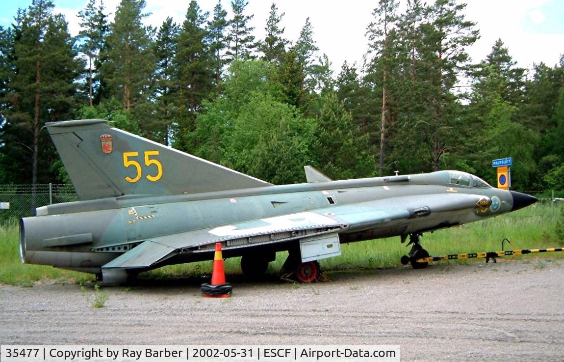 35477, Saab J-35F Draken C/N 35-477, SAAB J-35F Draken [35477] Linkoping-Malmen~SE 31/05/2002. Now been repainted and on a pole alongside the E4 Motorway junction 114 with code of 35.