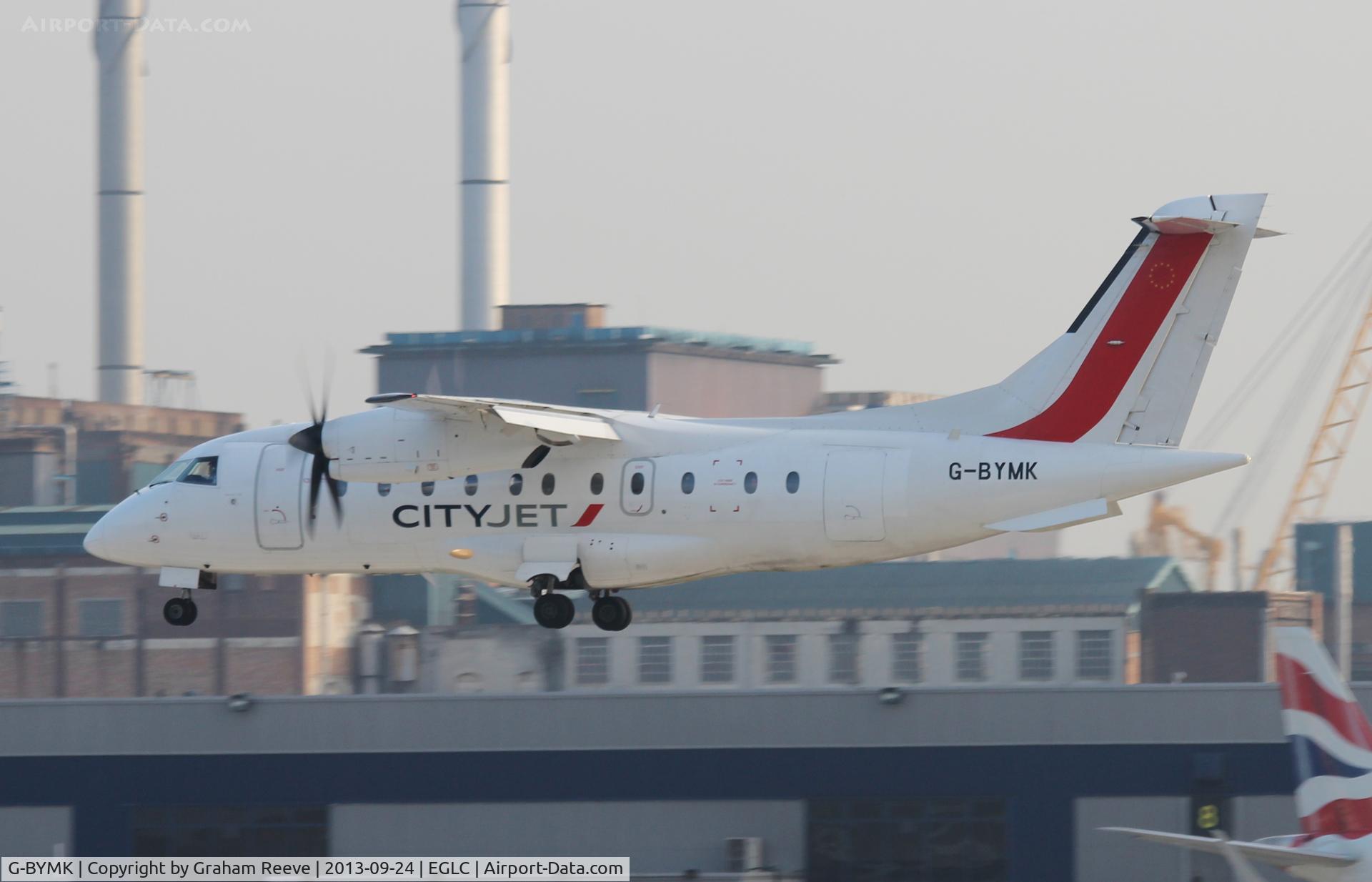G-BYMK, 1996 Dornier 328-100 C/N 3062, About to land.