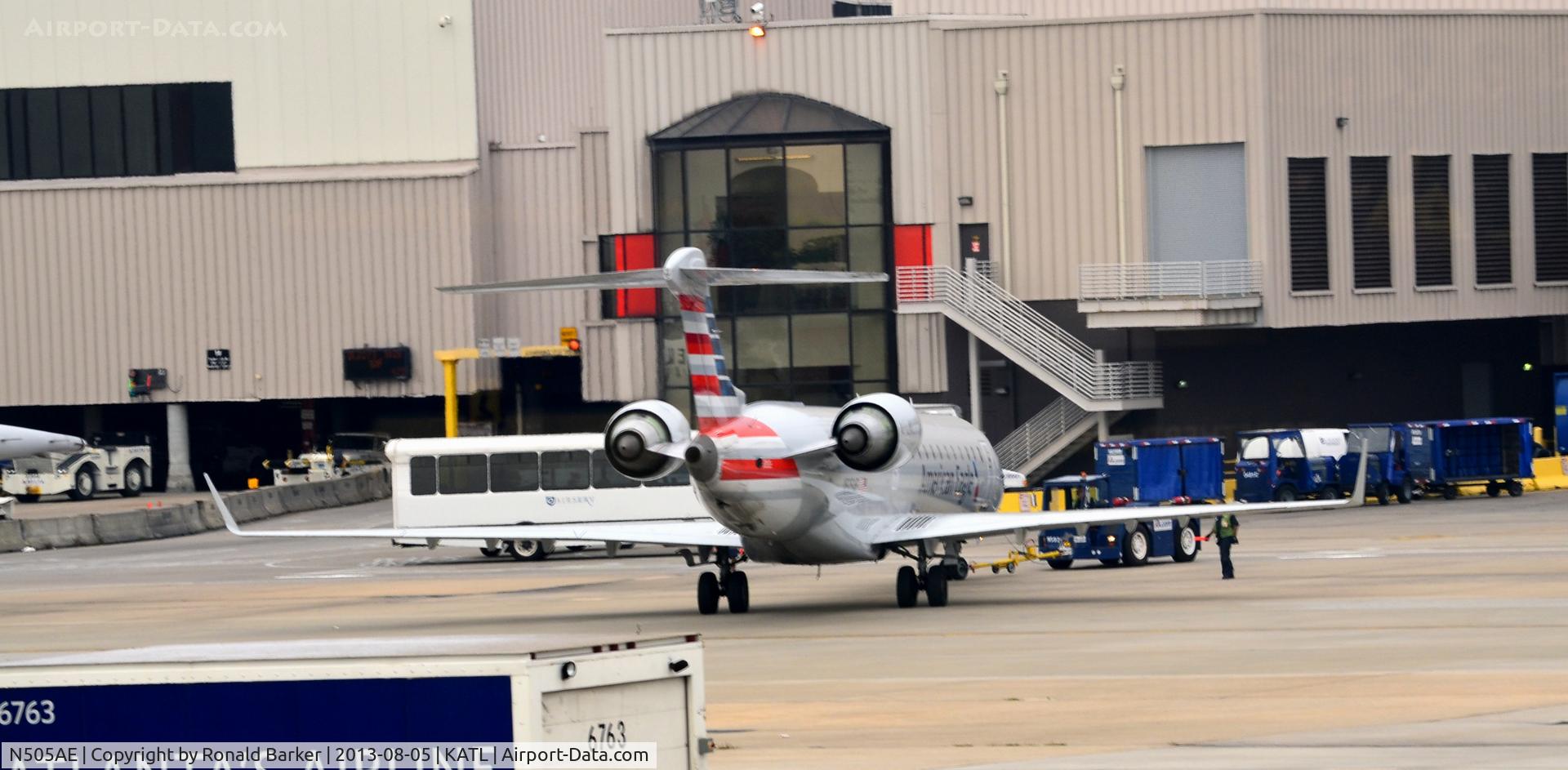 N505AE, 2002 Bombardier CRJ-701 (CL-600-2C10) Regional Jet C/N 10053, Push back Atlanta