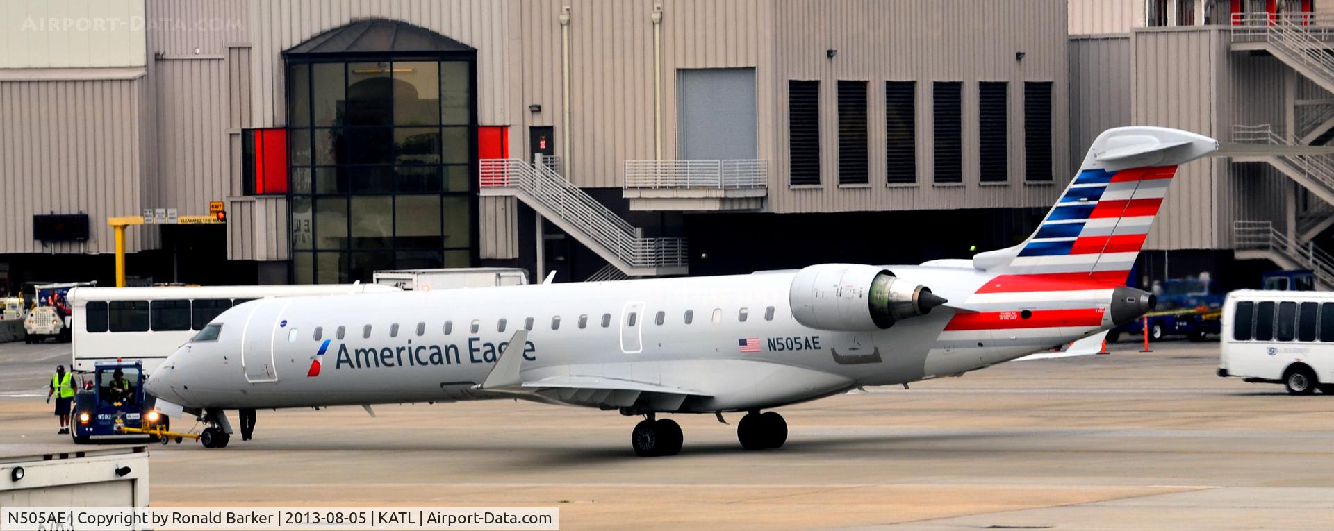 N505AE, 2002 Bombardier CRJ-701 (CL-600-2C10) Regional Jet C/N 10053, Push back Atlanta