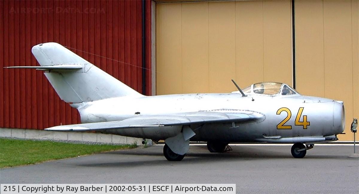215, PZL-Mielec Lim-2 (MiG-15bis) C/N 1B00215, Mikoyan-Gurevich MiG-15bis (Lim-2) [1B00215] Linkoping-Malmen~SE 31/05/2002. Coded 24 when taken here now preserved inside in Hall 2 unmarked.