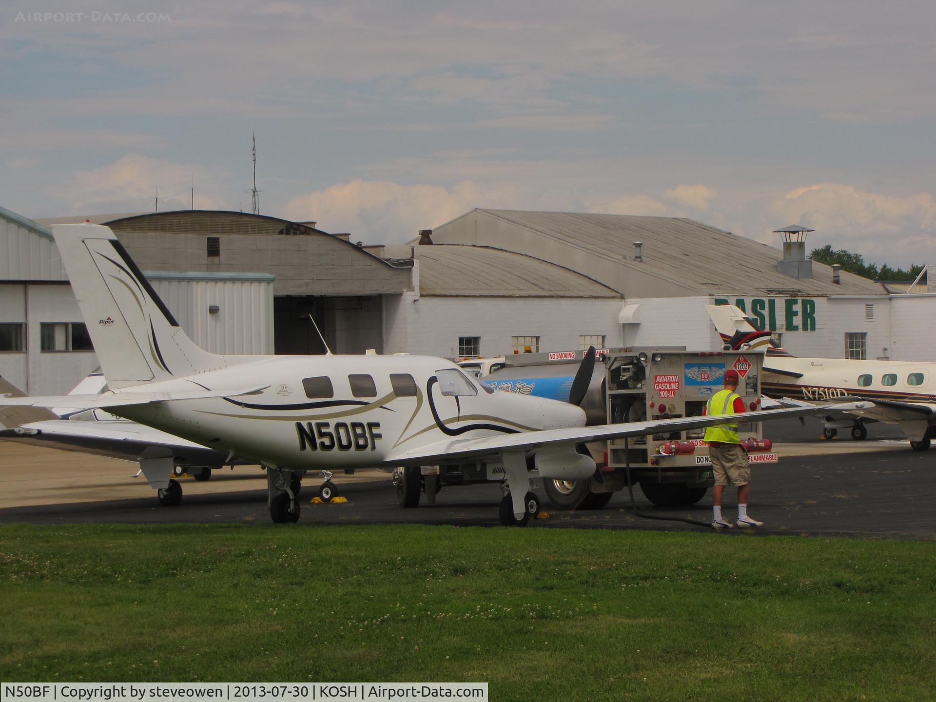 N50BF, 2004 Piper PA-46-350P Malibu Mirage C/N 4636355, Basler FBO Ramp