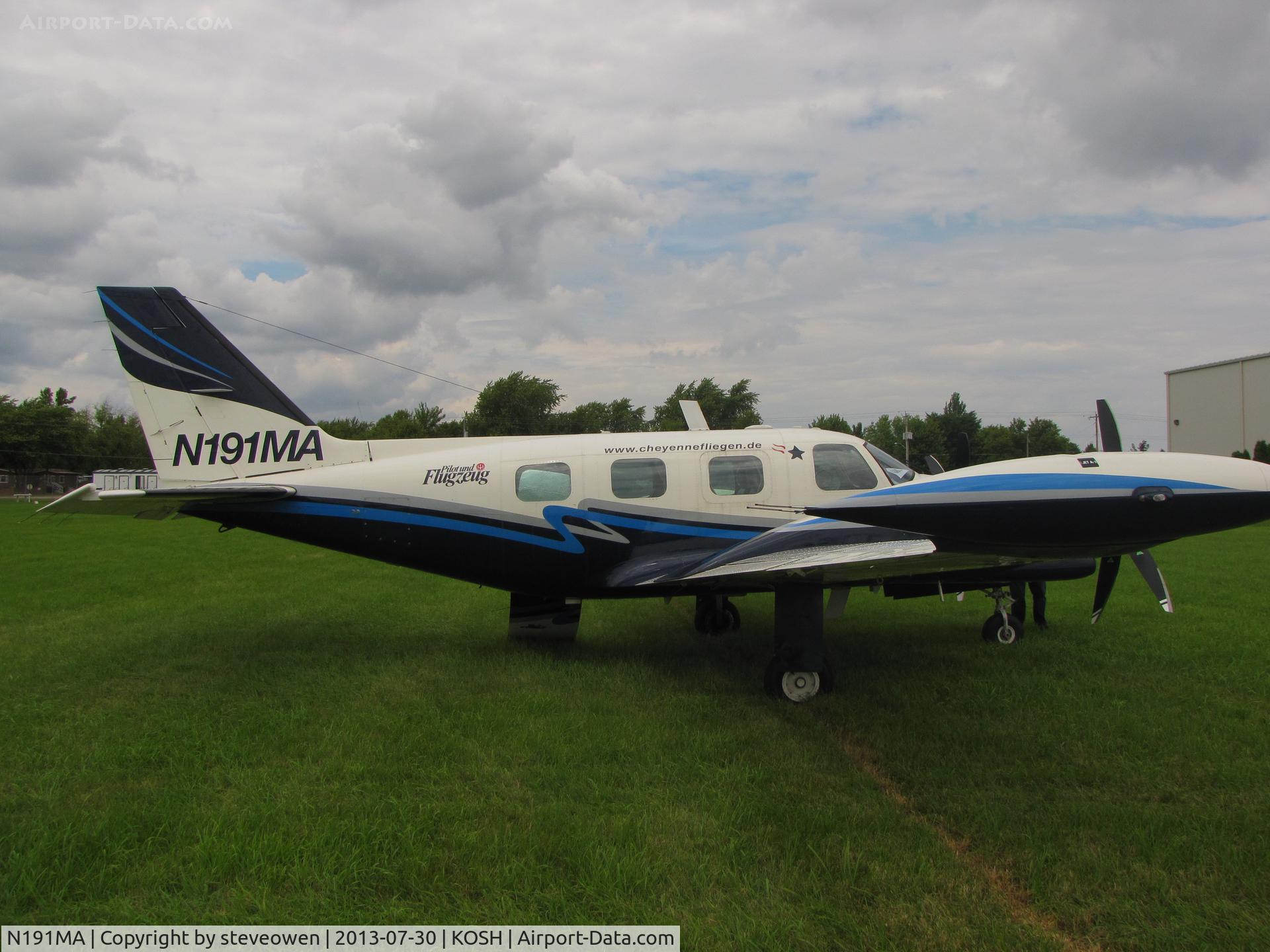 N191MA, Piper PA-31T1 Cheyenne 1 C/N 31T-8104019, In the grass at Oshkosh
