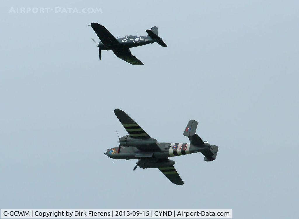 C-GCWM, 1945 North American B-25J Mitchell Mitchell C/N 108-47734, In formation with C-GVWC.