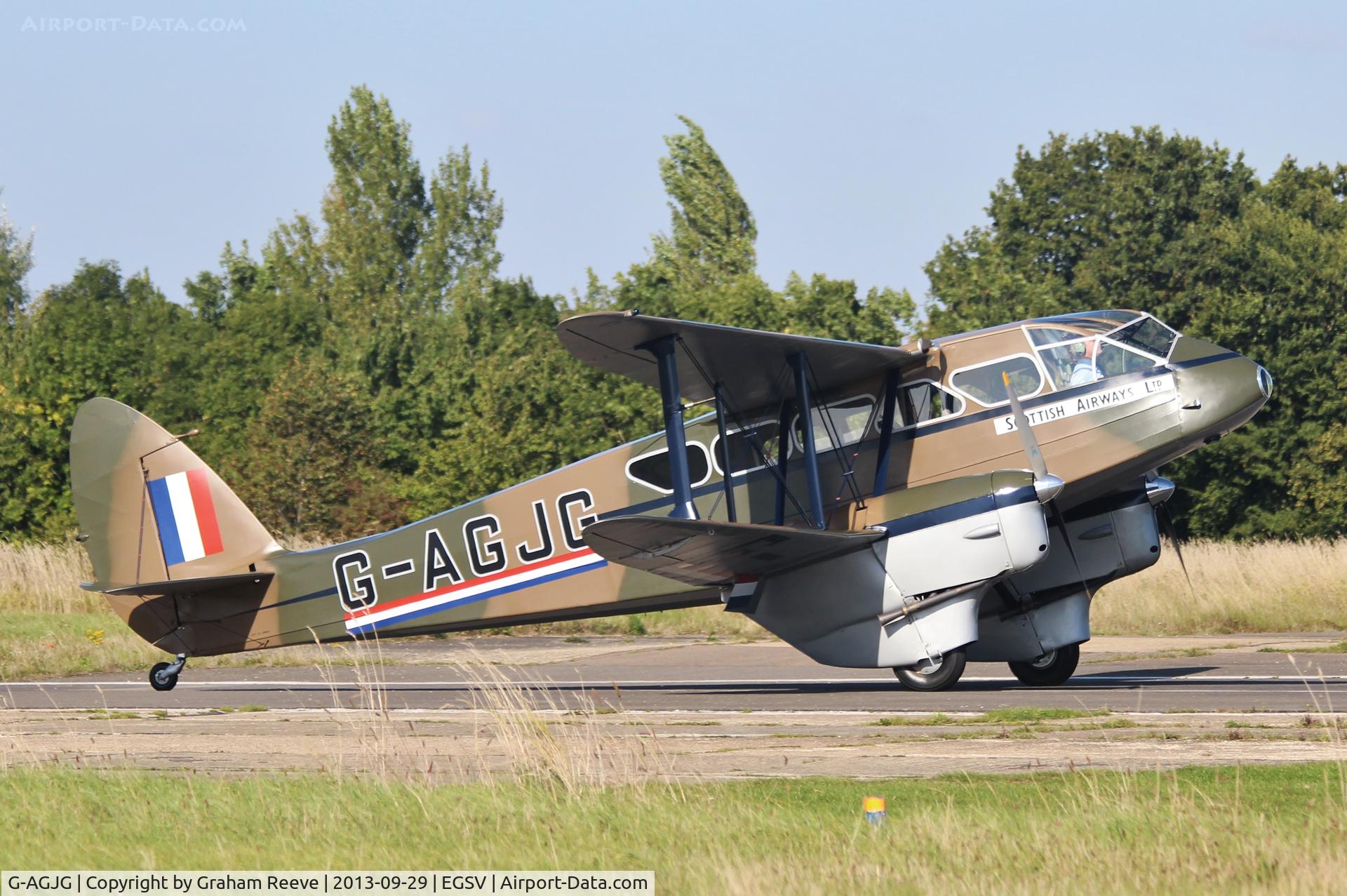G-AGJG, 1941 De Havilland DH-89A Dominie/Dragon Rapide C/N 6517, Just touched down at Old Buckenham.