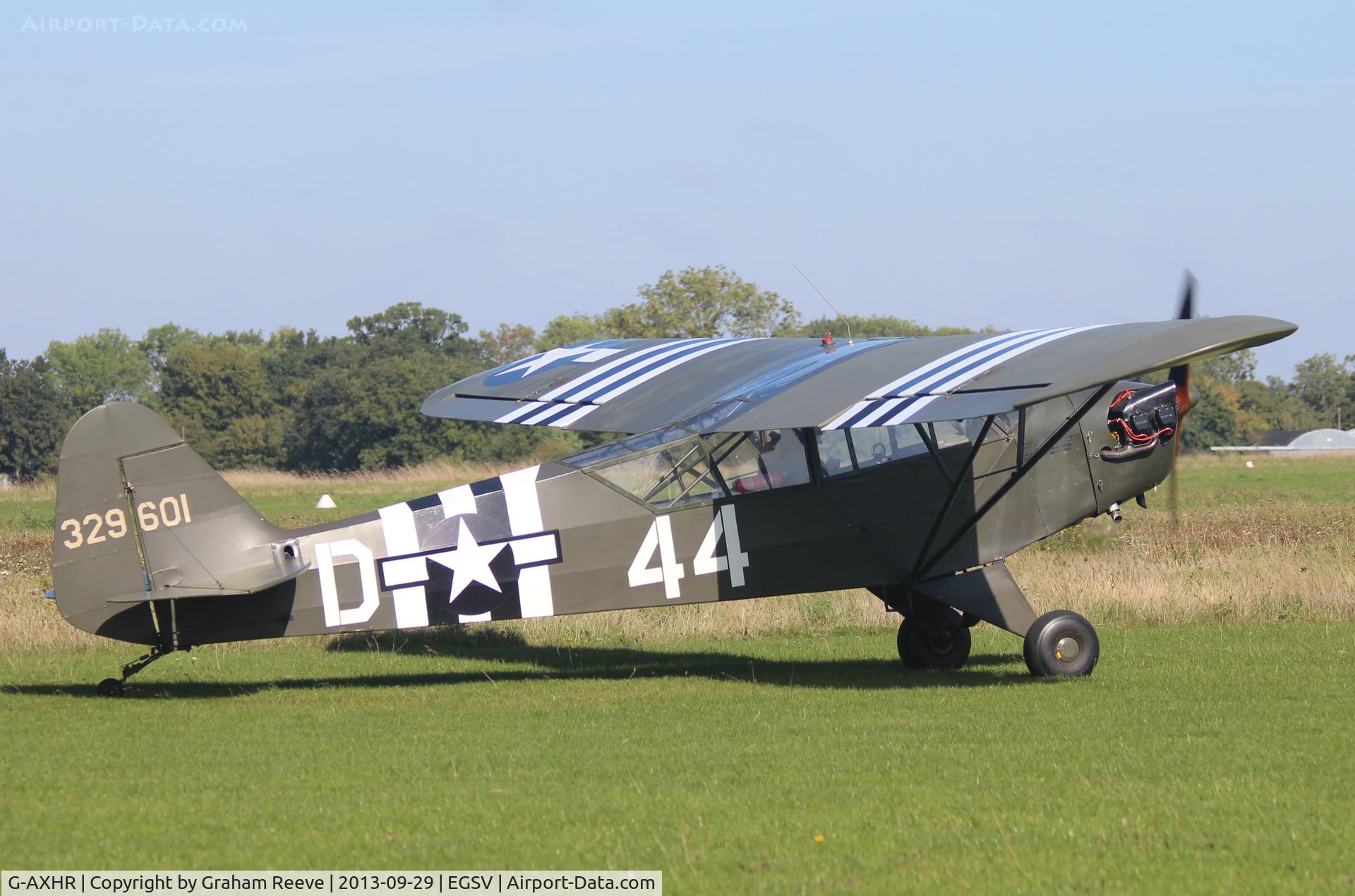 G-AXHR, 1943 Piper L-4H Grasshopper (J3C-65D) C/N 10892, Just landed.
