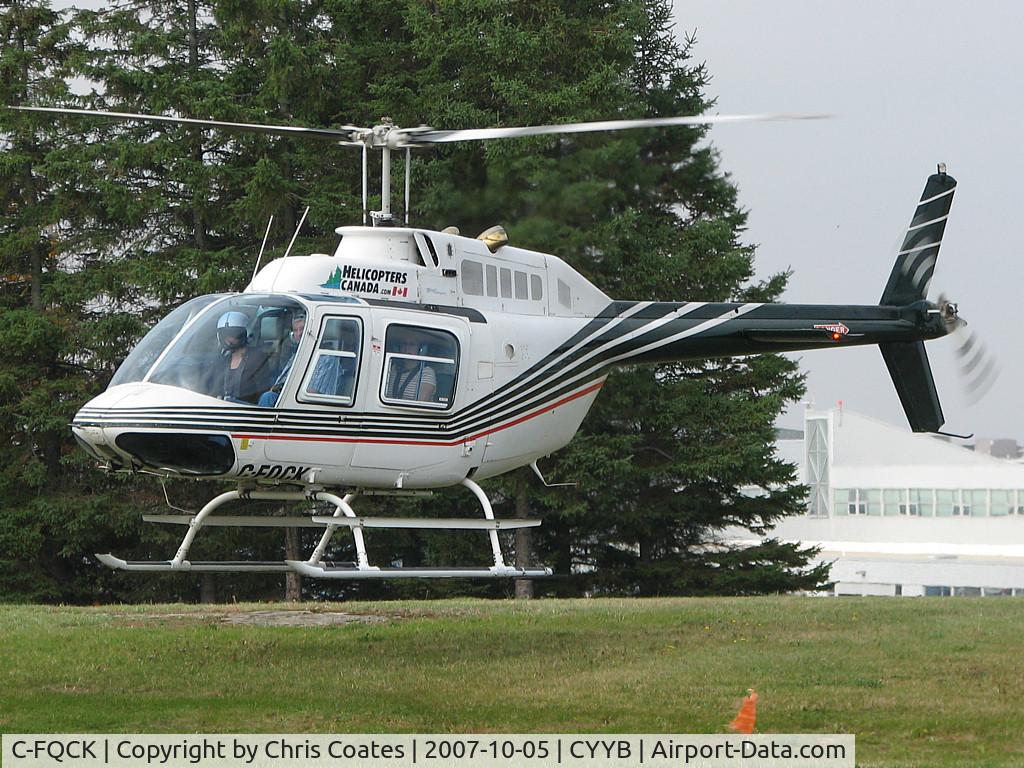 C-FQCK, 1971 Bell 206B JetRanger II C/N 692, This helicopter just lifted off at North Bay Intl & then headed north on a scenic flight to see the wonderful Fall colours in the wild forest below.