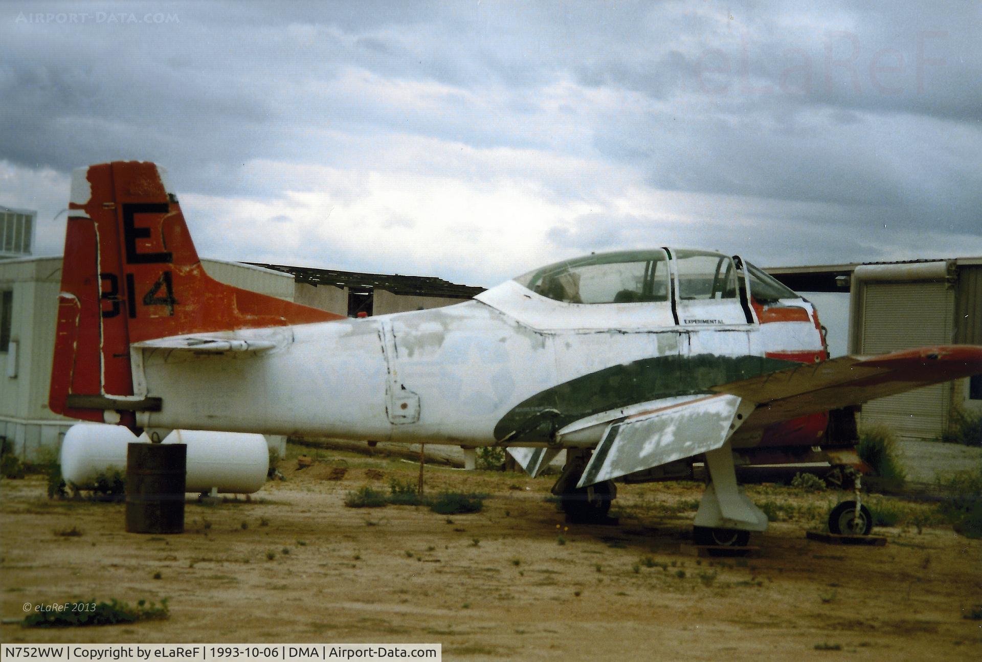 N752WW, 1954 North American T-28B Trojan C/N 200-115, Seen in a Bob's Airpark, a Tucson scrapyard alongside DMA, prior to re-build (Obviously!) with it Bu Aer No. 137752 just about showing through the white overpaint