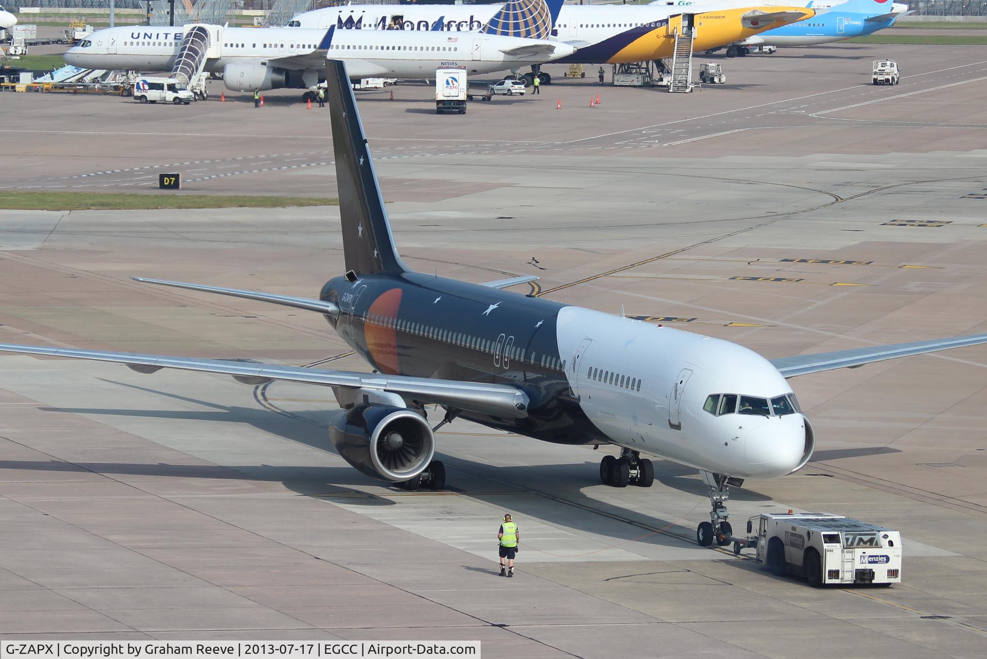 G-ZAPX, 2000 Boeing 757-256 C/N 29309, Under tow at Manchester.
