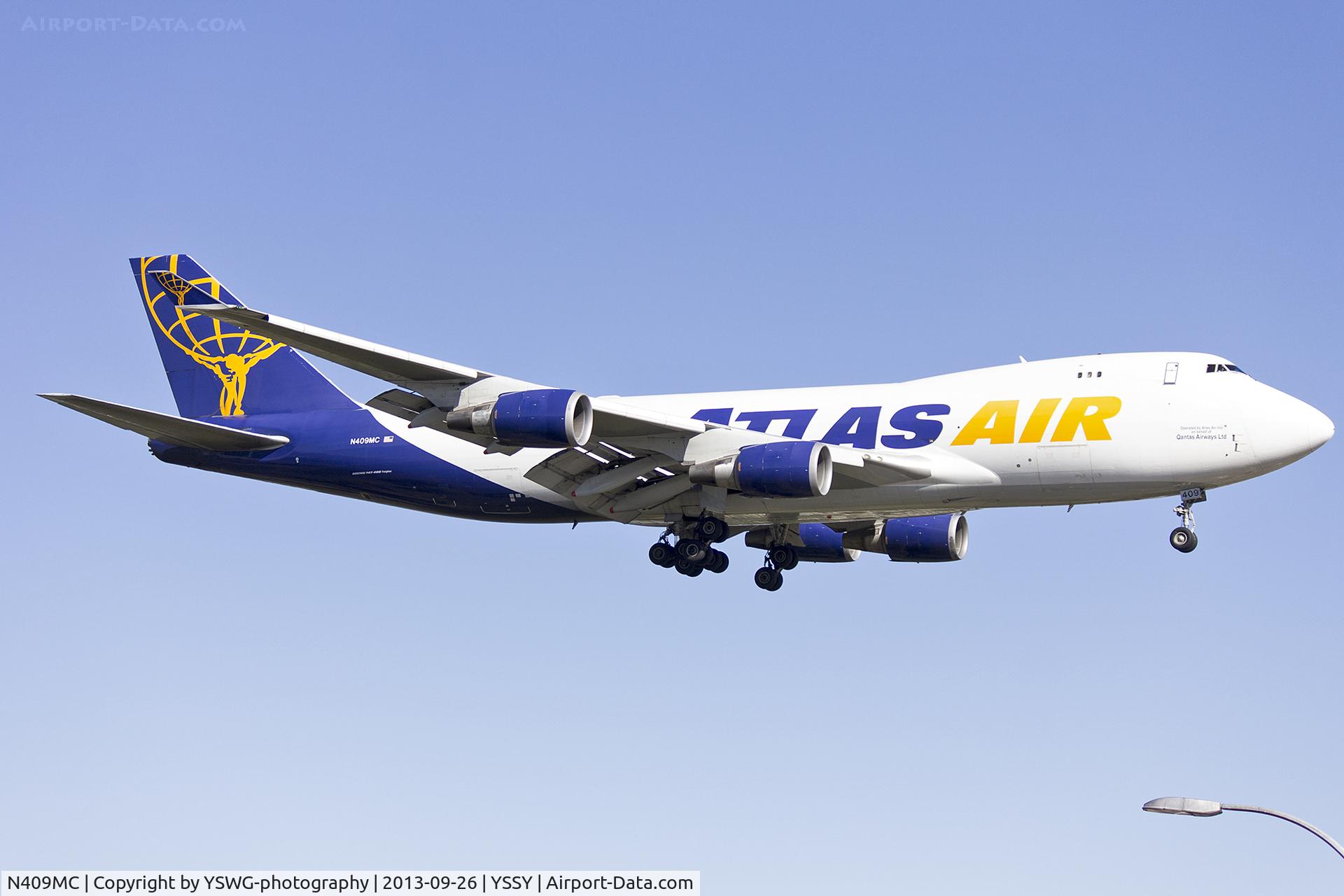 N409MC, 2000 Boeing 747-47UF C/N 30558/1242, Atlas Air (N409MC) Boeing 747-47UF on approach to runway 25 at Sydney Airport.