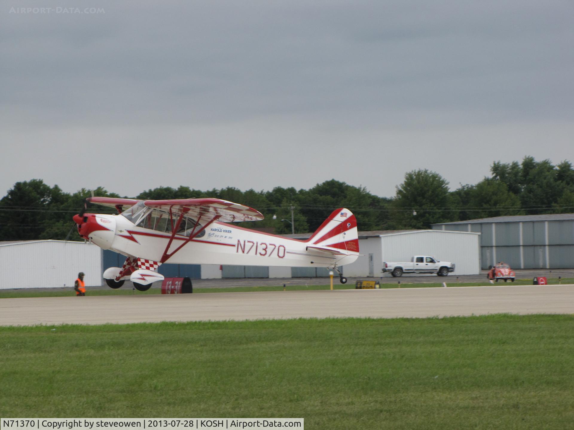 N71370, 1946 Piper J3C-65 Cub Cub C/N 22167, just about to touch down at KOSH
