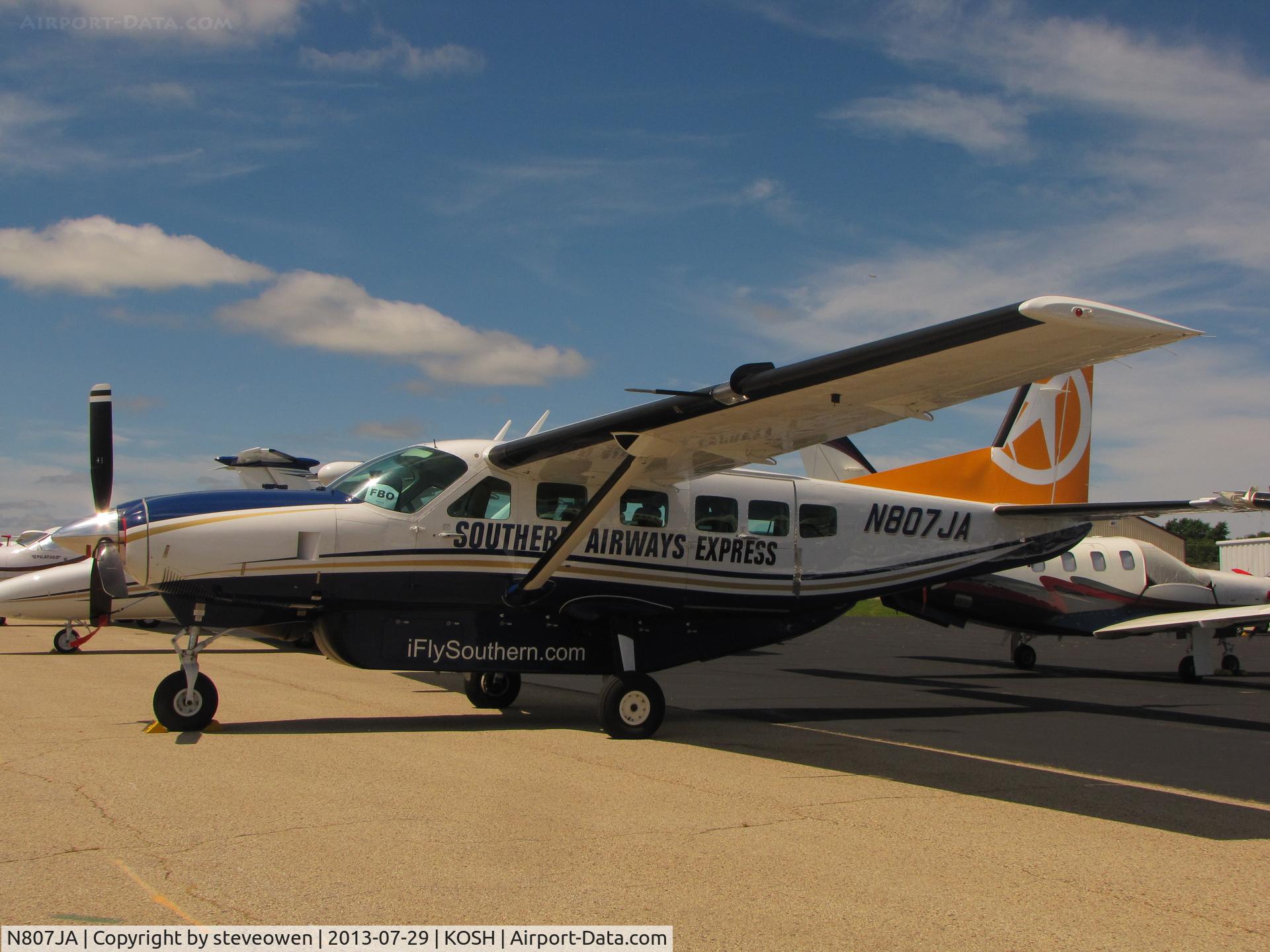 N807JA, 1985 Cessna 208 Caravan I C/N 20800075, Basler FBO ramp