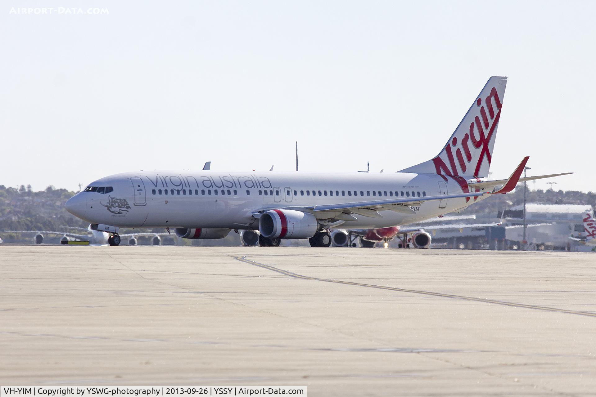 VH-YIM, 2012 Boeing 737-8FE C/N 38716, Virgin Australia (VH-YIM) Boeing 737-8FE(WL) taxiing to Echo holding point at Sydney Airport.