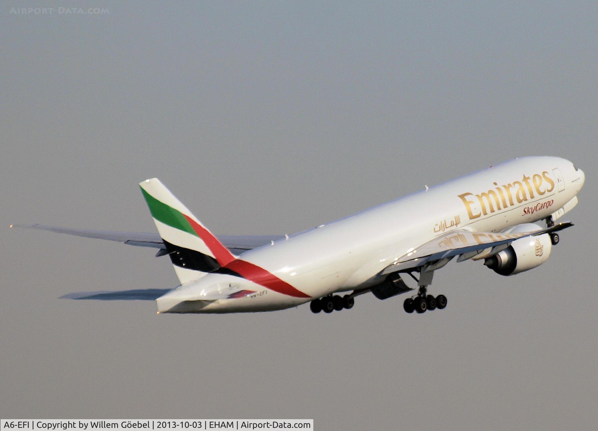 A6-EFI, 2012 Boeing 777-F1H C/N 35609, Take off from Schiphol Airport of runway 09