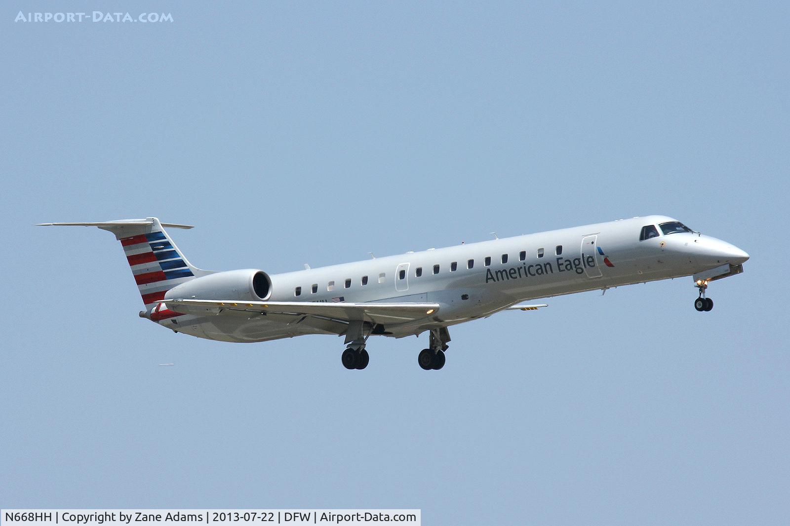N668HH, 2004 Embraer ERJ-145LR (EMB-145LR) C/N 145785, Landing at DFW Airport - New American Eagle paint.