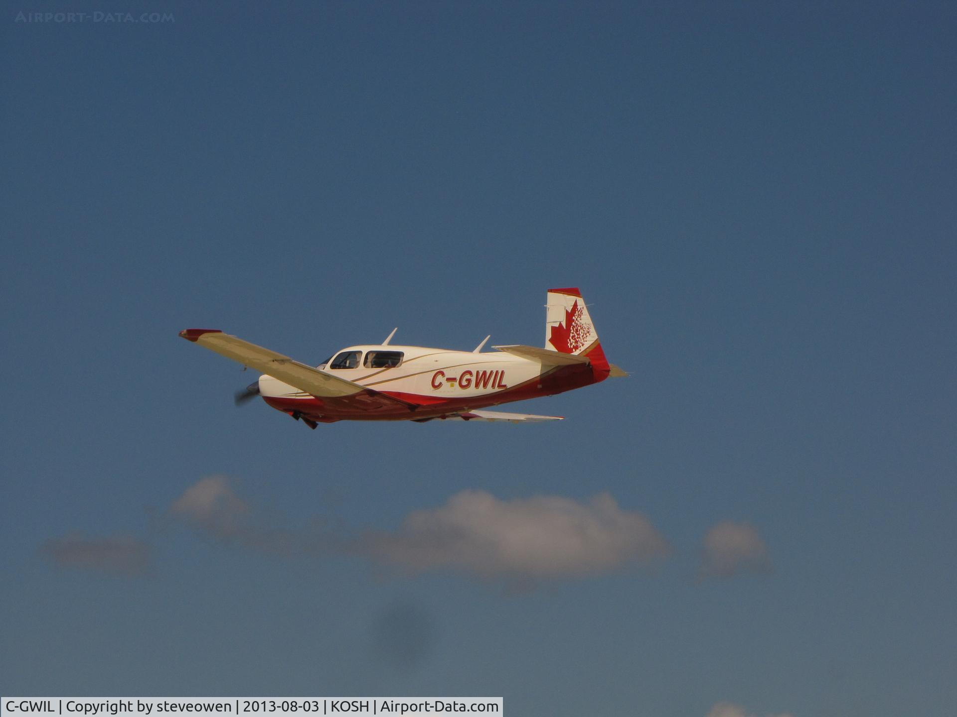 C-GWIL, 1981 Mooney M20K C/N 25-0592, Departing Oshkosh