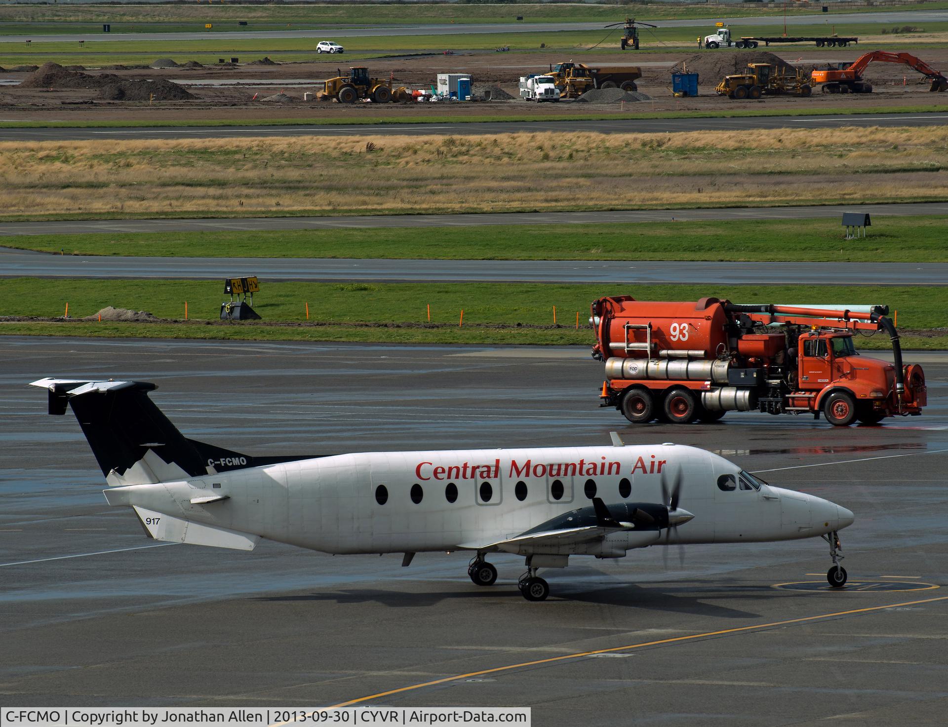 C-FCMO, 1997 Beech 1900D C/N UE-281, Departing domestic terminal, Vancouver International airport.