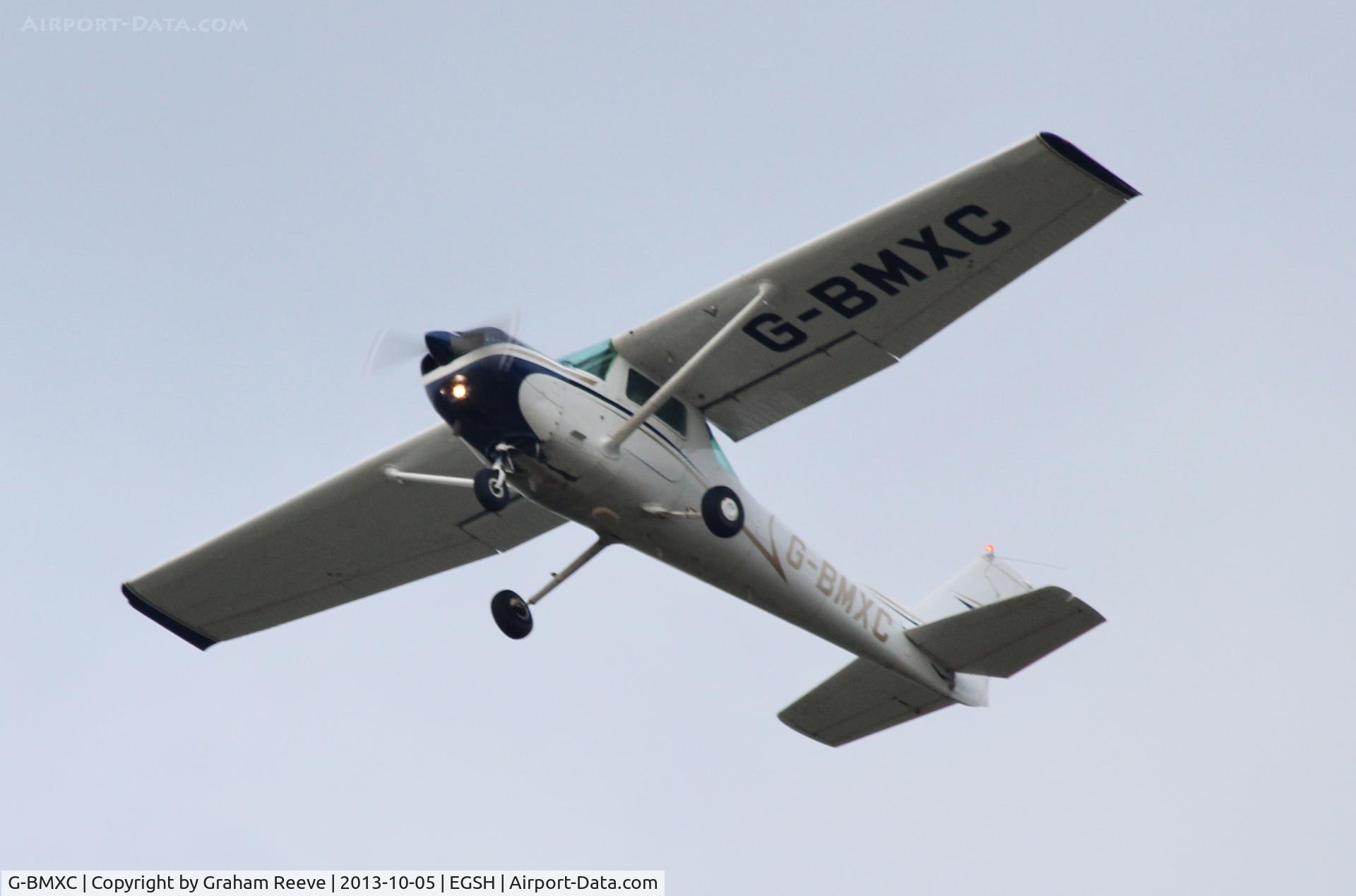 G-BMXC, 1977 Cessna 152 C/N 152-80416, Just taken off from Norwich.