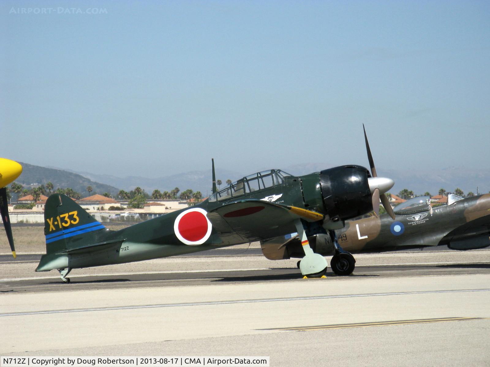 N712Z, 1942 Mitsubishi A6M3 Reisen (Zero) C/N 3869, 1942 Mitsubishi A6M3 ZERO-SEN 'ZEKE', P&W R-1830 1,130 Hp upgrade from original Sakai, on flight line