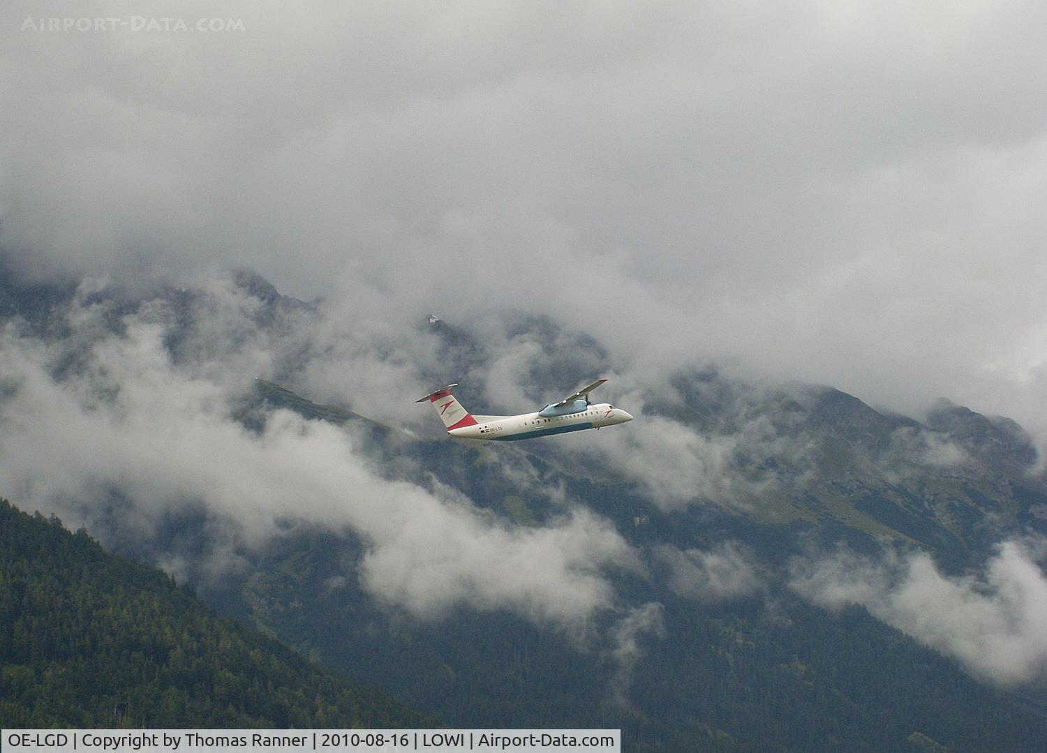 OE-LGD, 2000 De Havilland Canada DHC-8-402Q Dash 8 C/N 4027, take-off into a cloudy sky