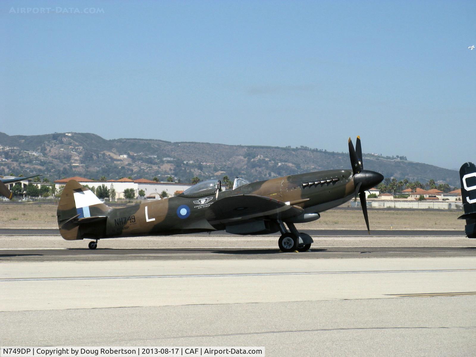 N749DP, 1945 Supermarine Spitfire XIV C/N 6S/583887, 1983 Vickers/Supermarine SPITFIRE Mk XIV, Rolls Royce Griffon 65 V-12 2,050 Hp, ex David Price current rebuild by CAF, on flight line