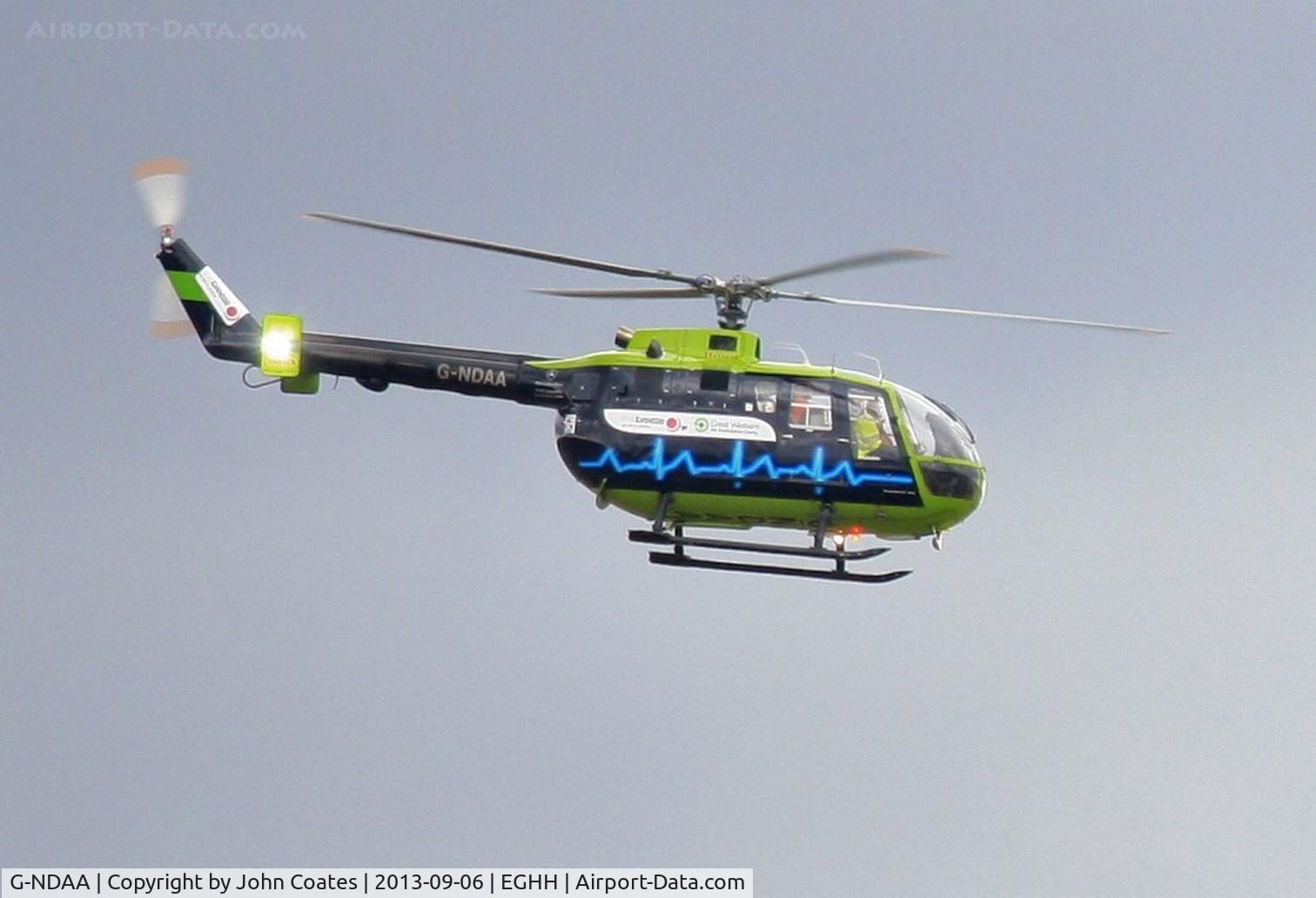 G-NDAA, 1974 MBB Bo-105DBS-4 C/N S-135/914, Crossing a/p after visit to hospital.