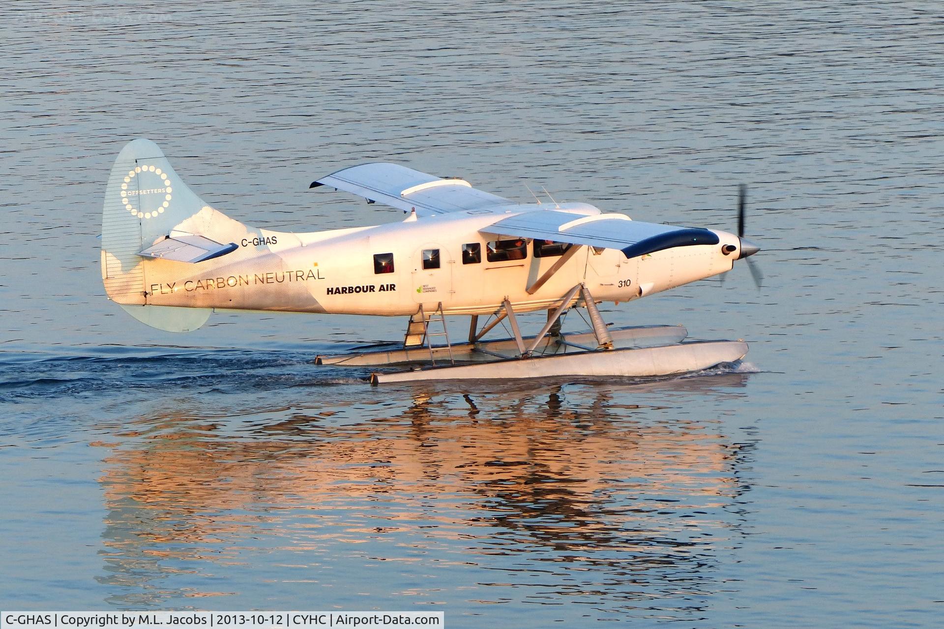 C-GHAS, 1958 De Havilland Canada DHC-3 Otter C/N 284, Harbour Air #310 departing Coal Harbour terminal shortly after sunrise.