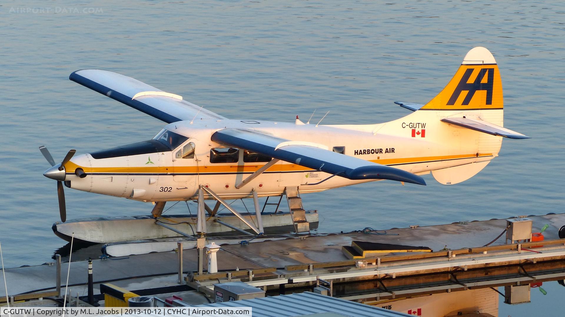 C-GUTW, 1960 De Havilland Canada DHC-3 Turbo Otter Otter C/N 405, Harbour Air#302 at the Coal Harbour terminal shortly after sunrise.