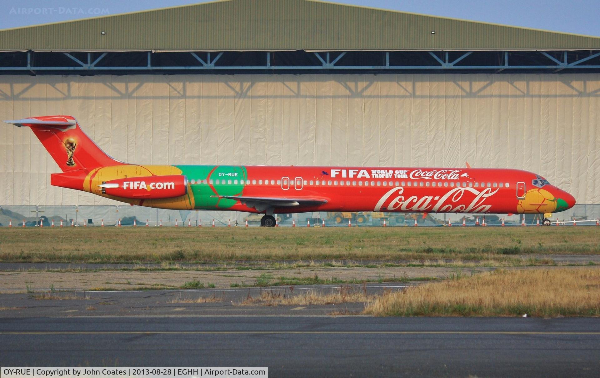 OY-RUE, 1990 McDonnell Douglas MD-83 (DC-9-83) C/N 49936, Taxiing for departure in new Coca Cola / FIFA World Cup livery.