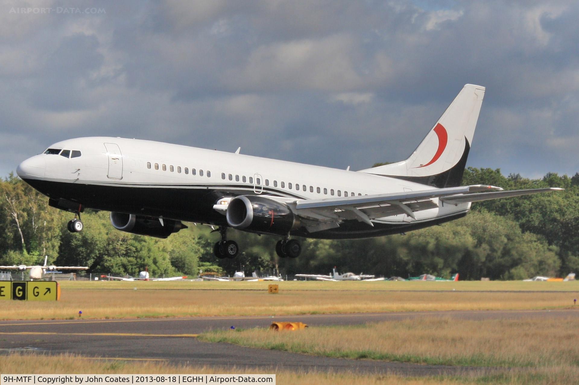 9H-MTF, 1987 Boeing 737-329 C/N 23774, ex SX-MTF about to touchdown.