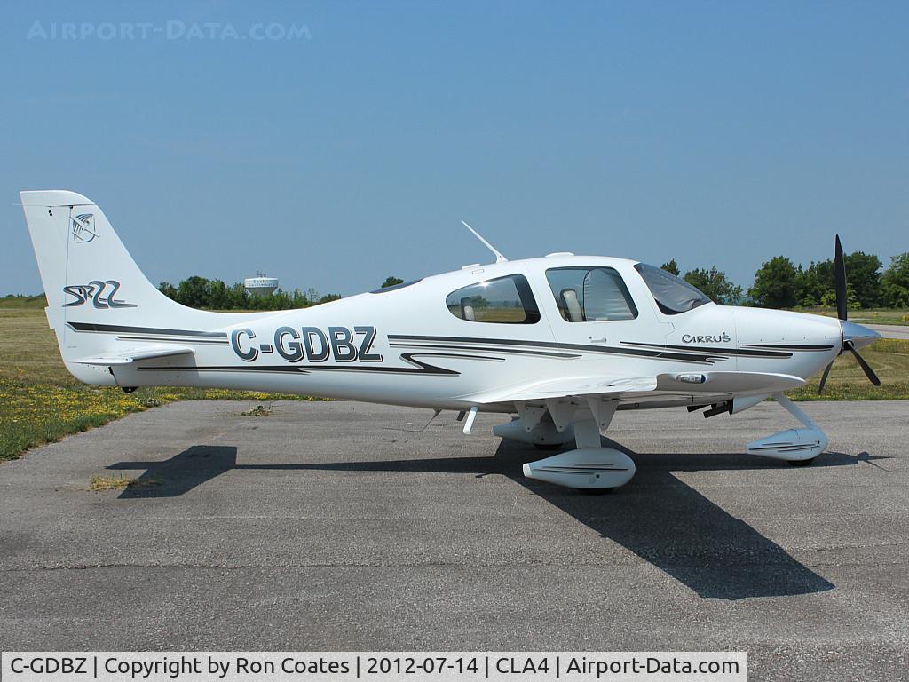 C-GDBZ, 2003 Cirrus SR22 C/N 0499, This 2003 Cirrus SR22 sits in bright sunshine on the ramp at the Holland Landing Airport, (CLA4) north of Toronto