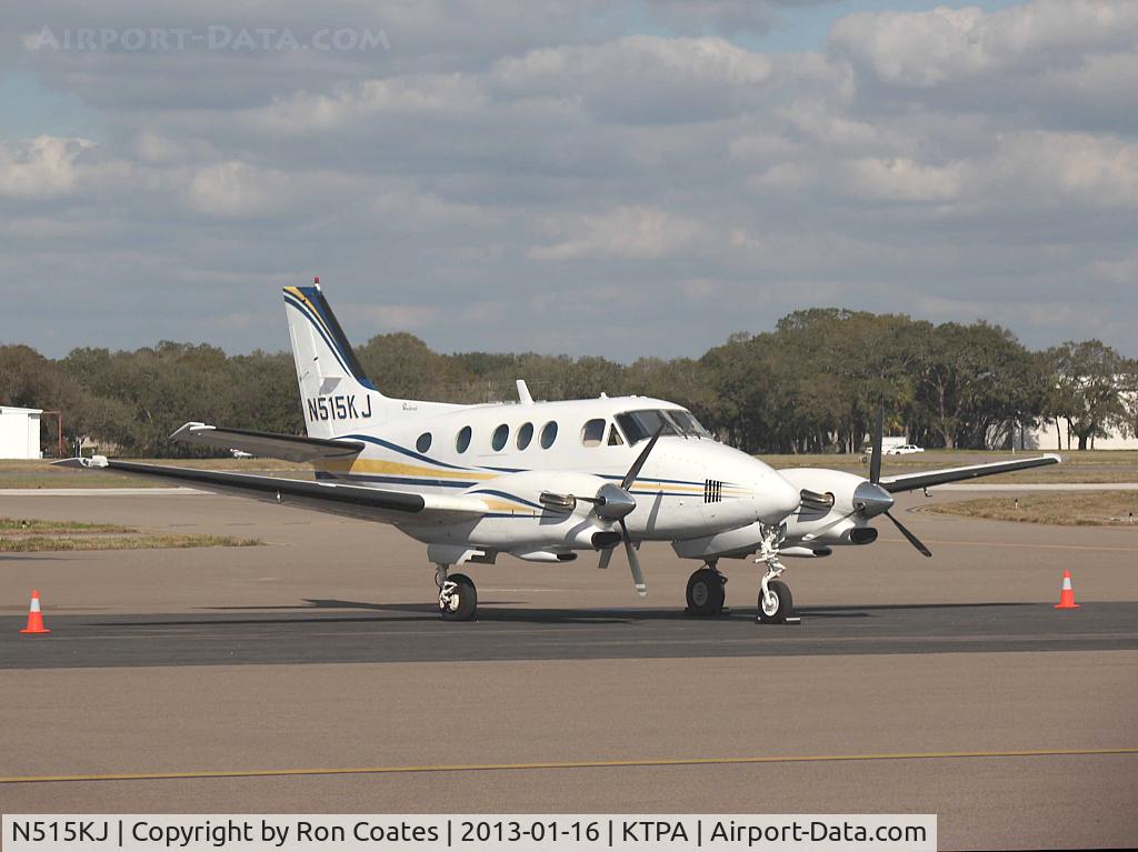 N515KJ, 1972 Beech C90 King Air C/N LJ-566, 1972 Beech King Air sits in the bright afternoon sun on Tampa's General aviation ramp at the Tampa Int'l Airport