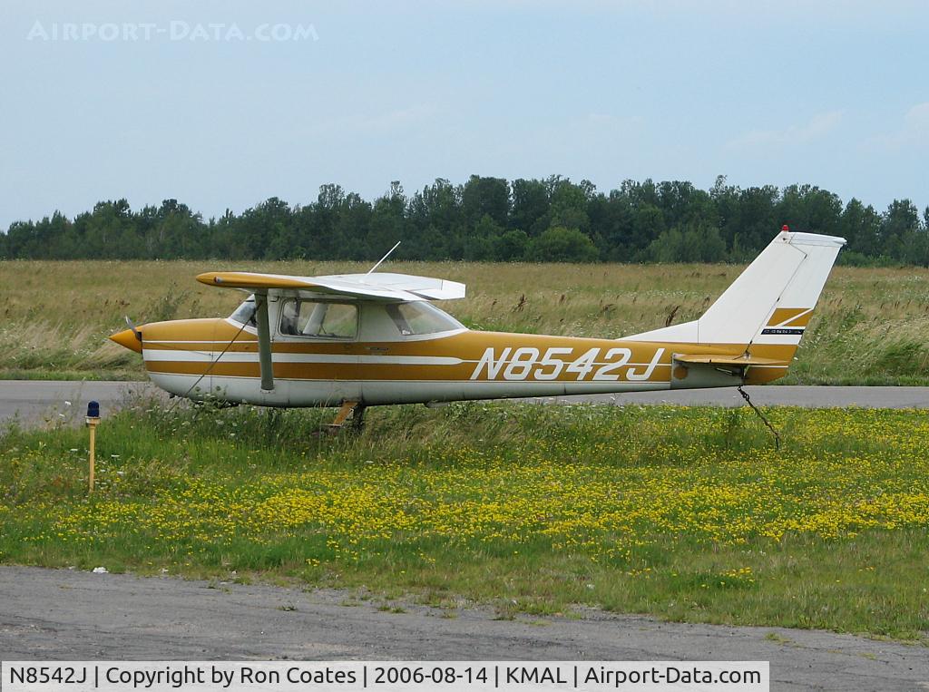 N8542J, 1967 Cessna 150G C/N 15066442, This 1967 Cessna 150G sits tied down among the dandelions at the Malone-Dufort Airport in Malone NY. (KMAL)