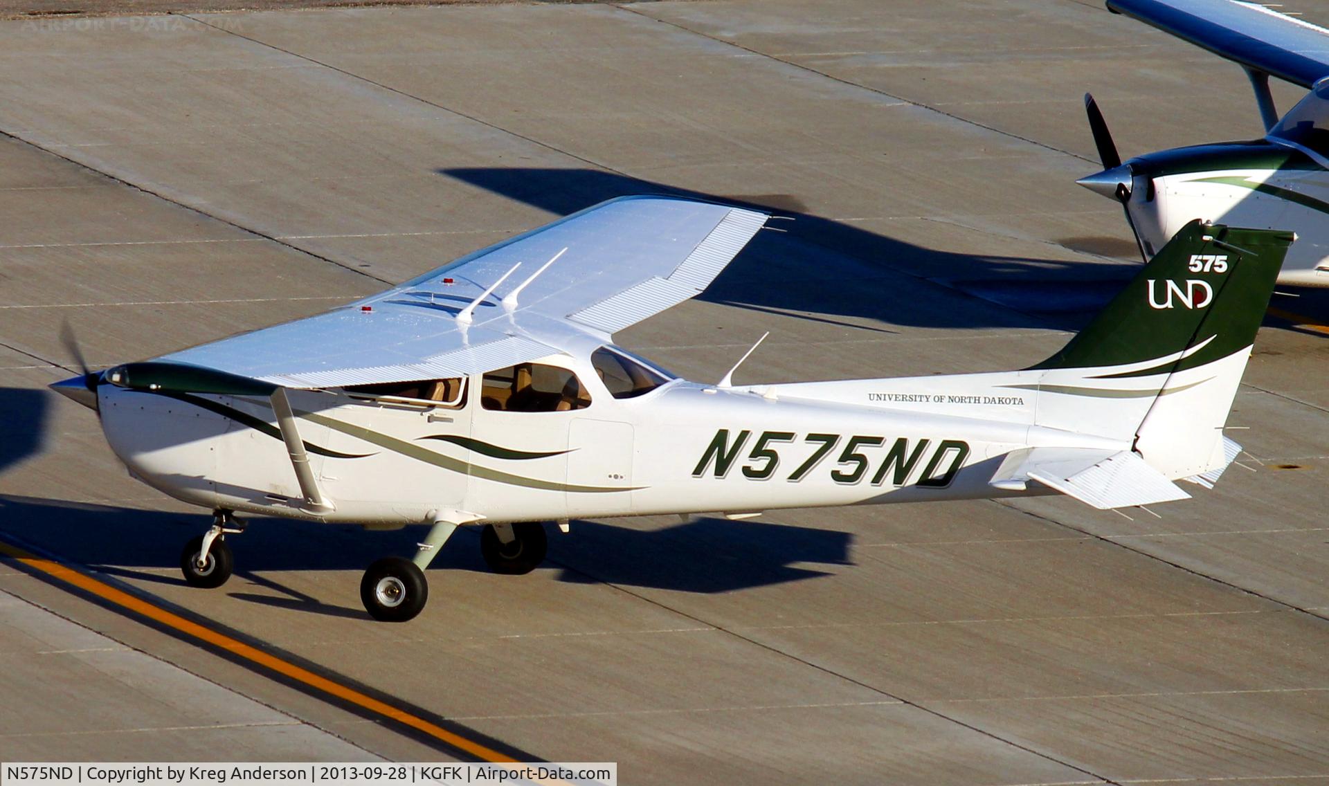 N575ND, Cessna 172S C/N 172S10954, University of North Dakota Cessna 172S Skyhawk taxiing from the Charlie ramp to the active runway.