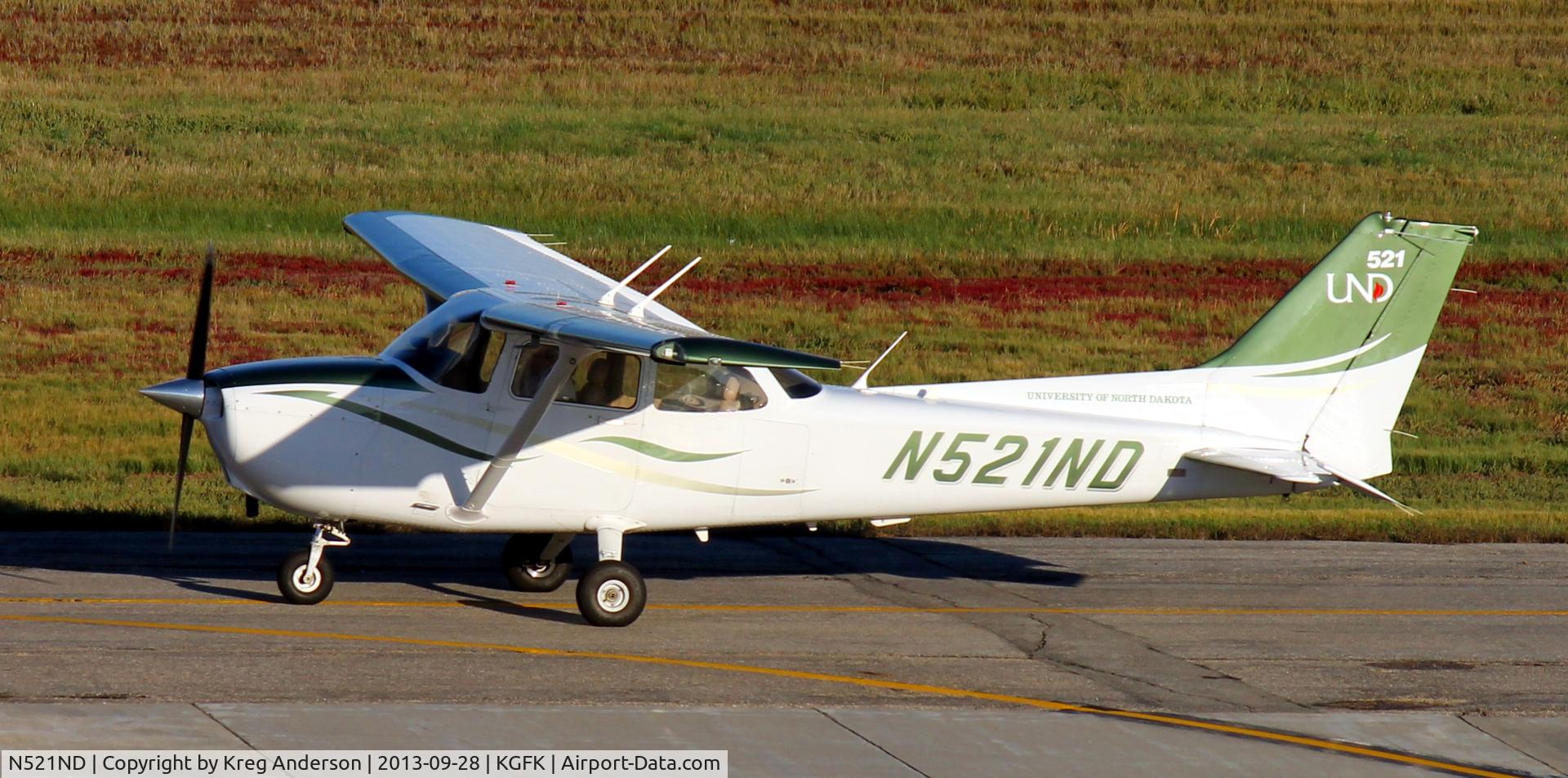 N521ND, Cessna 172S C/N 172S10975, University of North Dakota Cessna 172S Skyhawk taxiing from the Charlie ramp to the active runway.