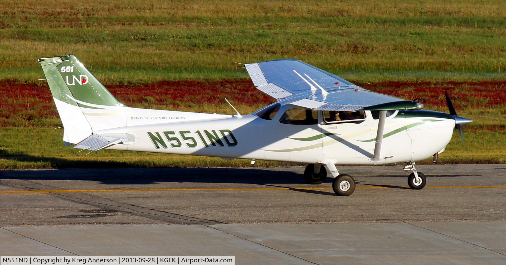 N551ND, 2008 Cessna 172S C/N 172S10858, University of North Dakota Cessna 172S Skyhawk taxiing from the Charlie ramp to the active runway.