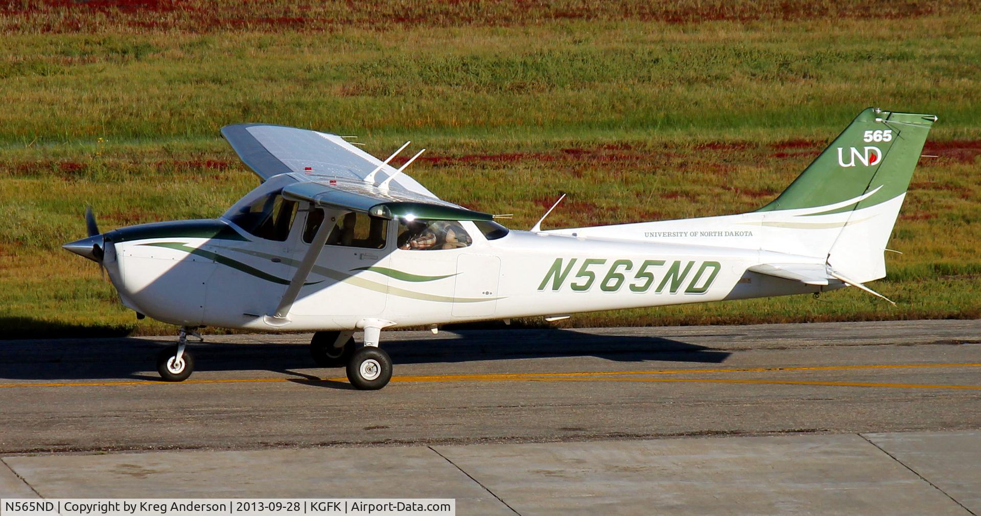 N565ND, 2008 Cessna 172S C/N 172S10797, University of North Dakota Cessna 172S Skyhawk taxiing from the Charlie ramp to the active runway.