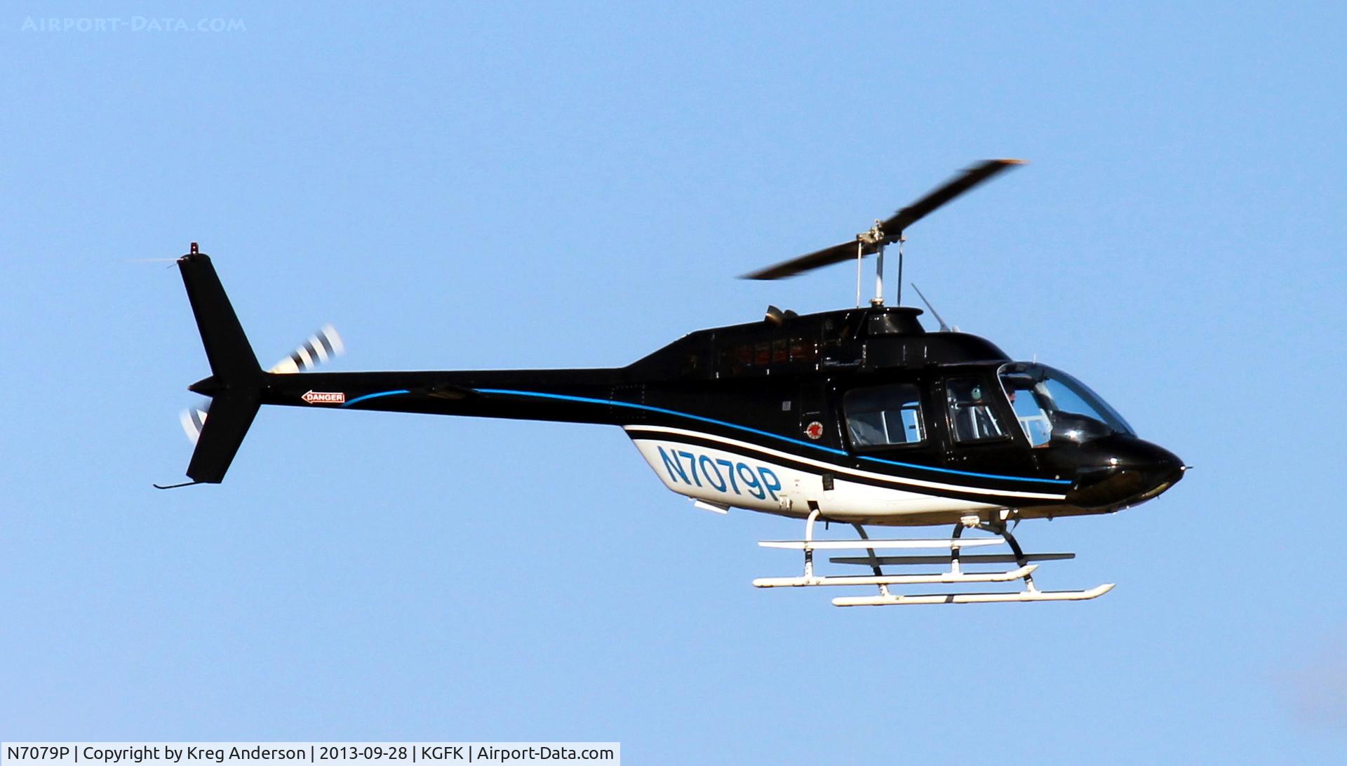 N7079P, 1997 Bell 206B C/N 4458, University of North Dakota Bell 206B JetRanger landing back at GFK.