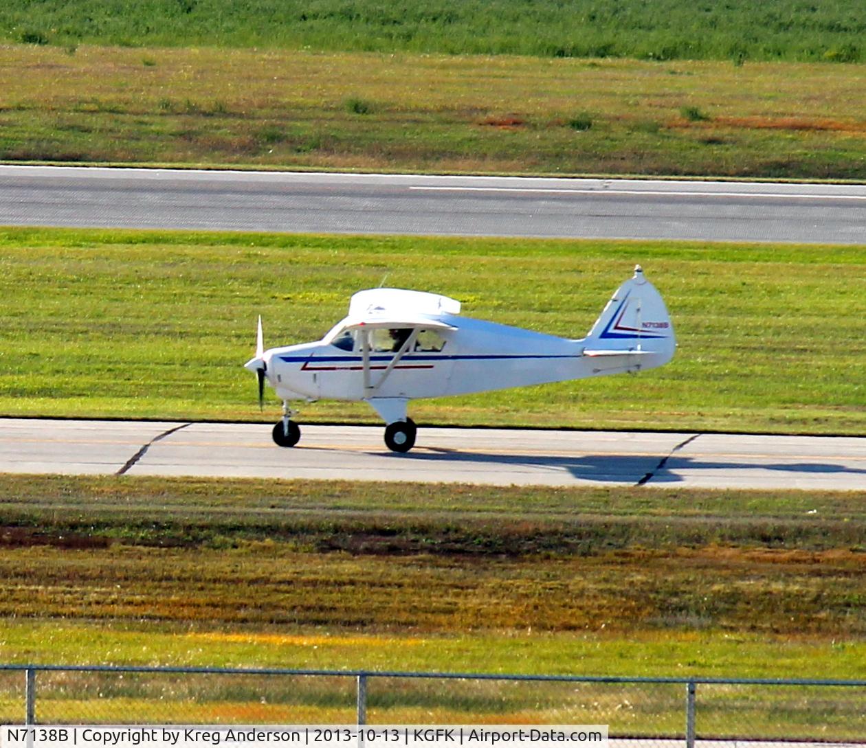 N7138B, 1956 Piper PA-22-150 Tri Pacer C/N 22-4358, Piper PA-22-150 Tri-Pacer taxiing to the FBO.