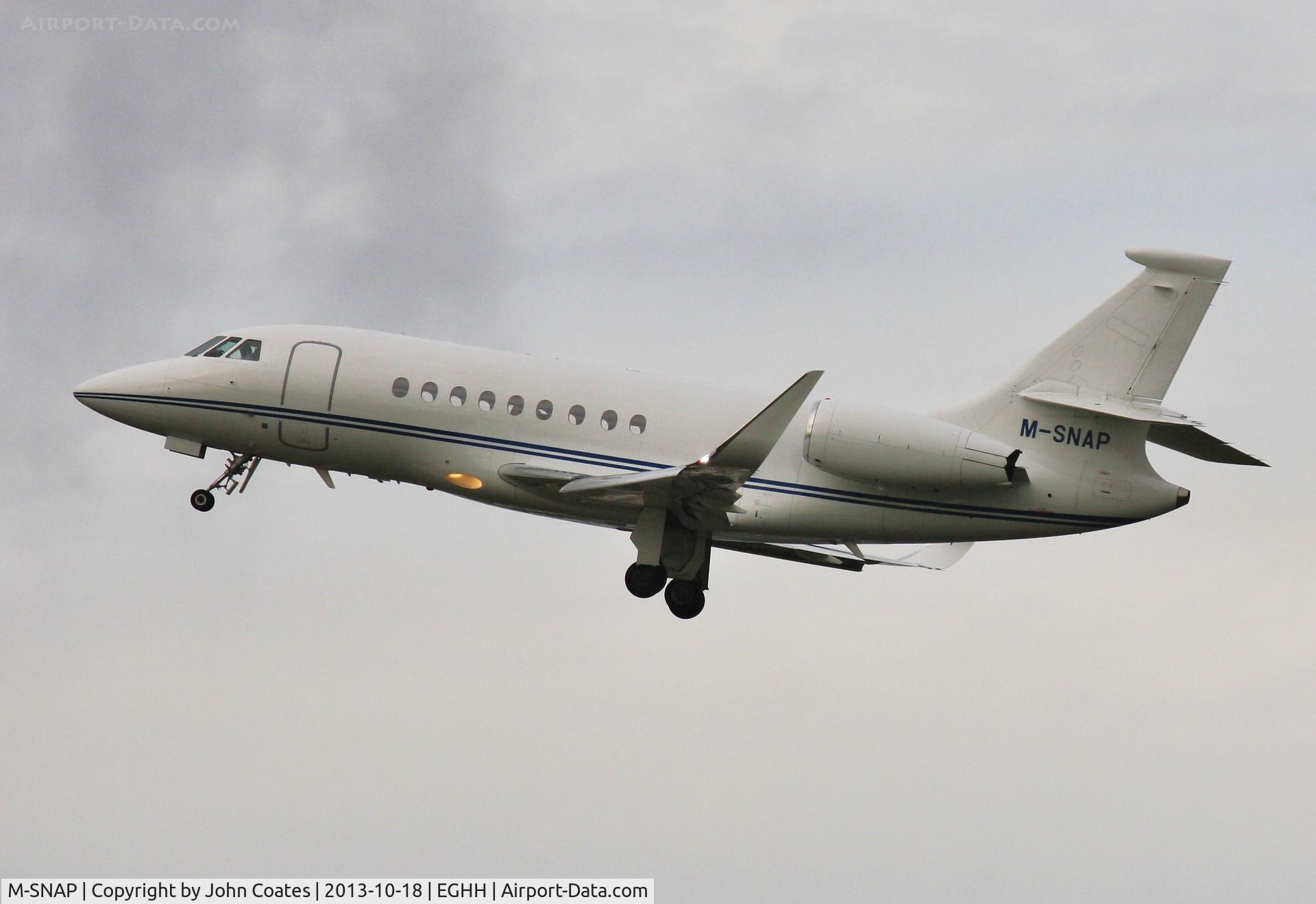 M-SNAP, 2006 Dassault Falcon 2000EX C/N 89, Departing 26 on a grey day.