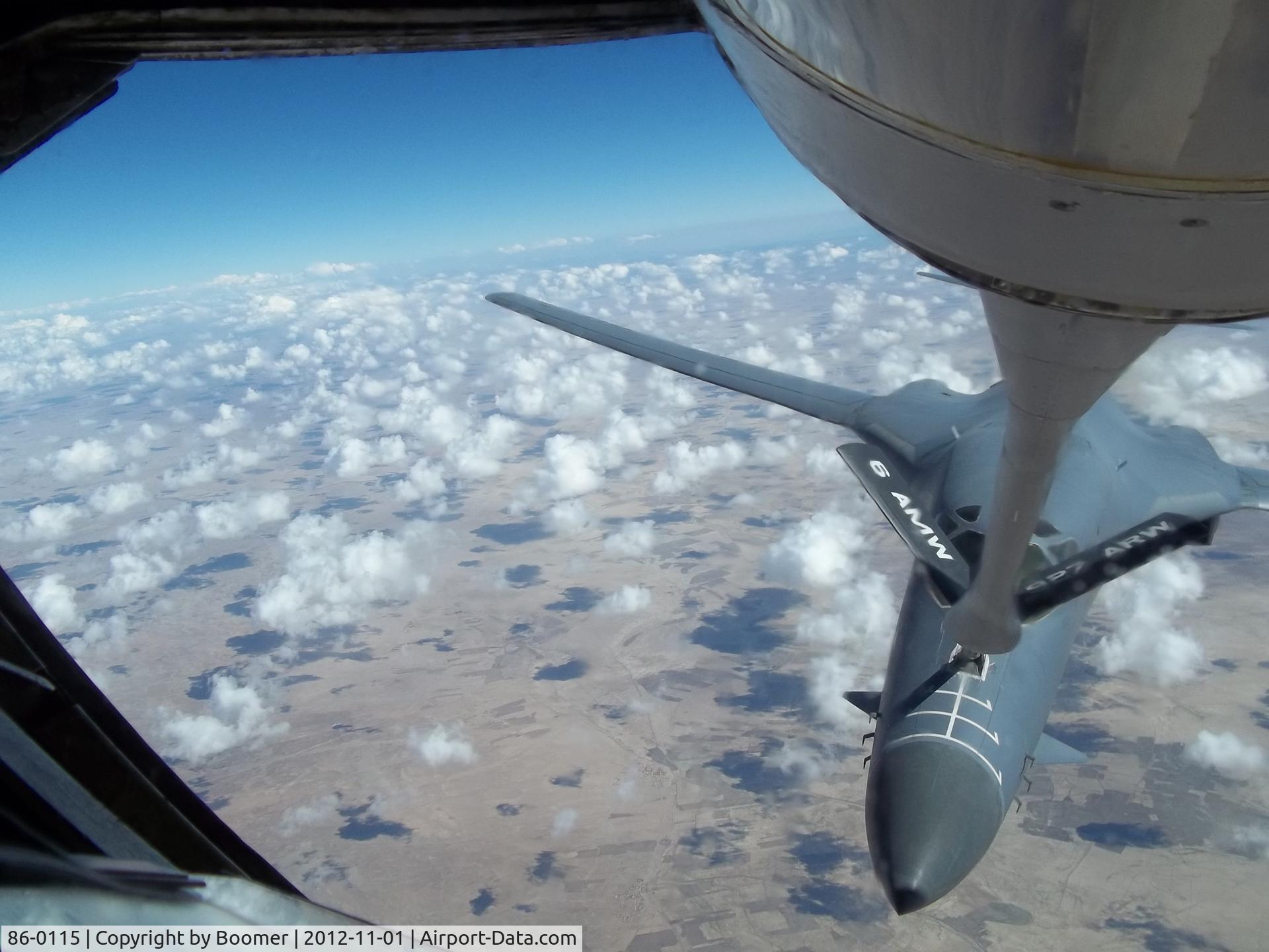 86-0115, 1985 Rockwell B-1B Lancer C/N 75, -0115 refueling on a clear day over Afghanistan