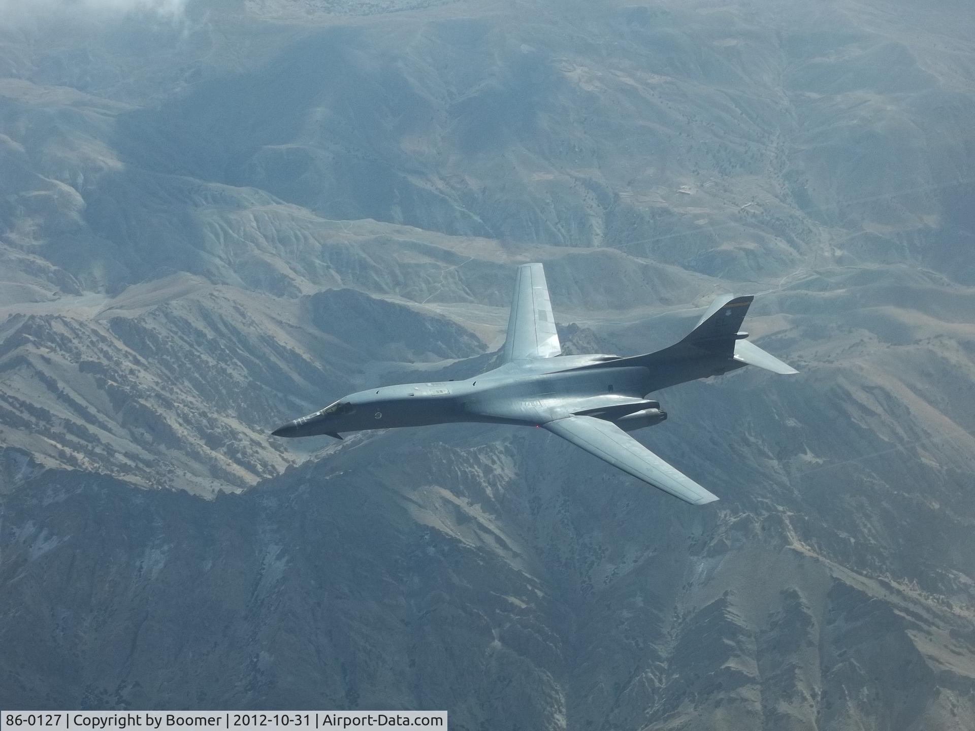 86-0127, 1986 Rockwell B-1B Lancer C/N 87, -0127 post-refueling over Afghanistan
