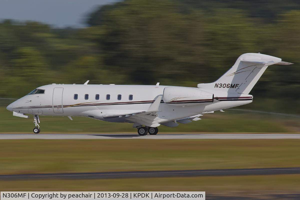 N306MF, 2004 Bombardier Challenger 300 (BD-100-1A10) C/N 20009, 1/60th  sec - takeoff shot