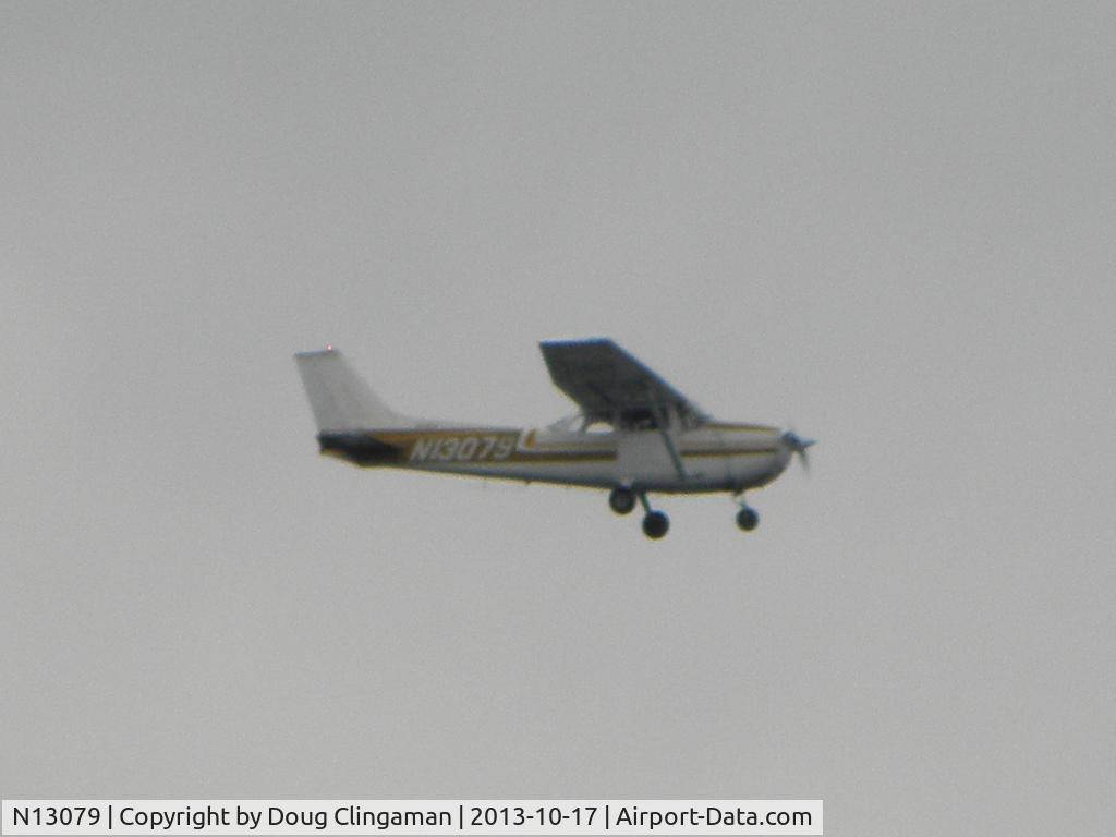 N13079, 1973 Cessna 172M C/N 17262480, Was taking photographs and happened to look up.