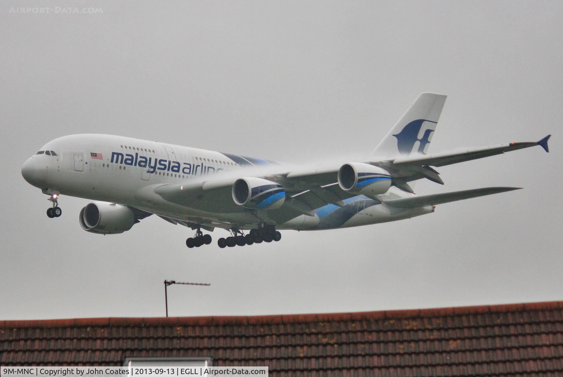 9M-MNC, 2011 Airbus A380-841 C/N 084, Low finals to 27L in heavy drizzle.