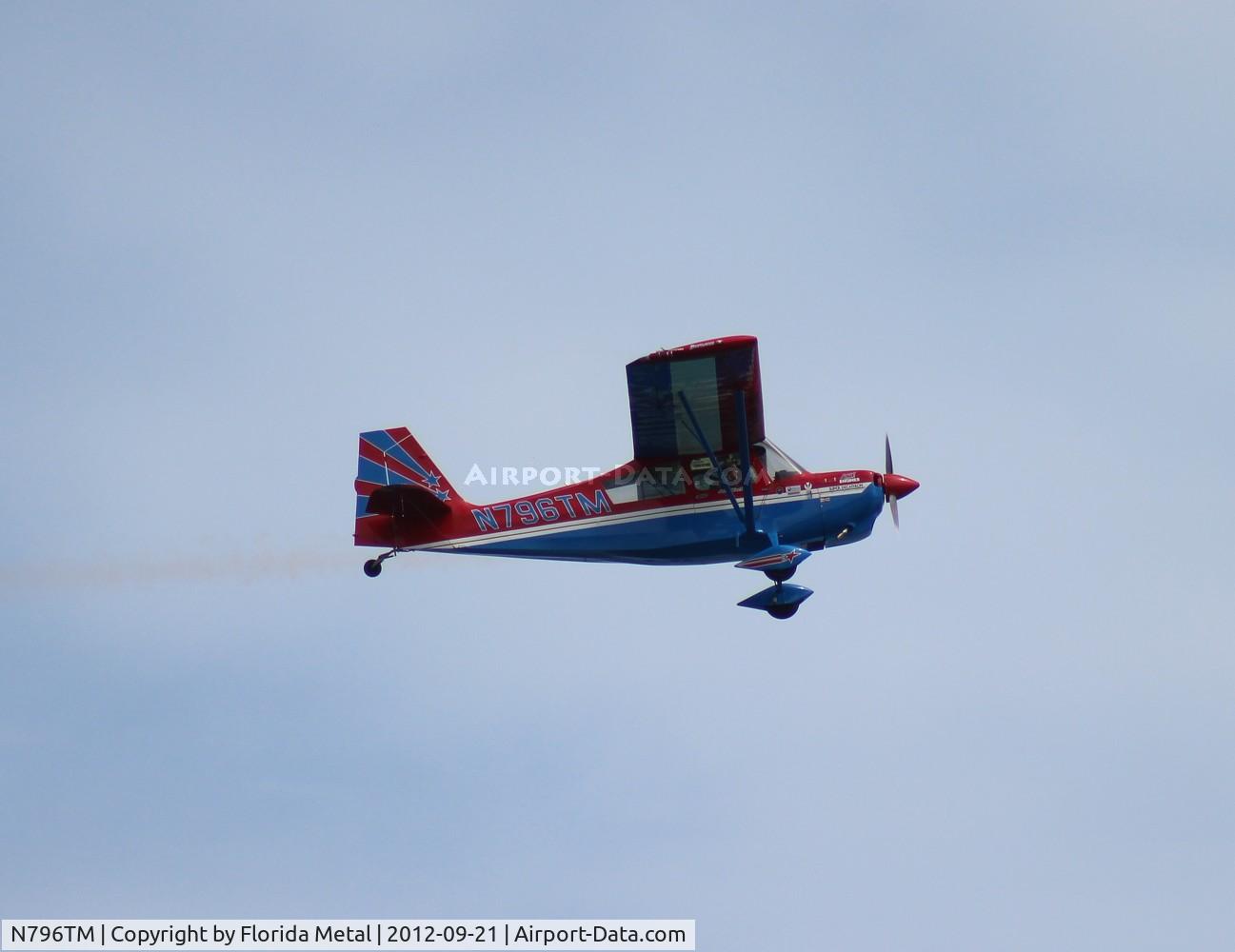 N796TM, 1996 American Champion 8KCAB Super Decathlon C/N 779-96, John Black performing over Cocoa Beach